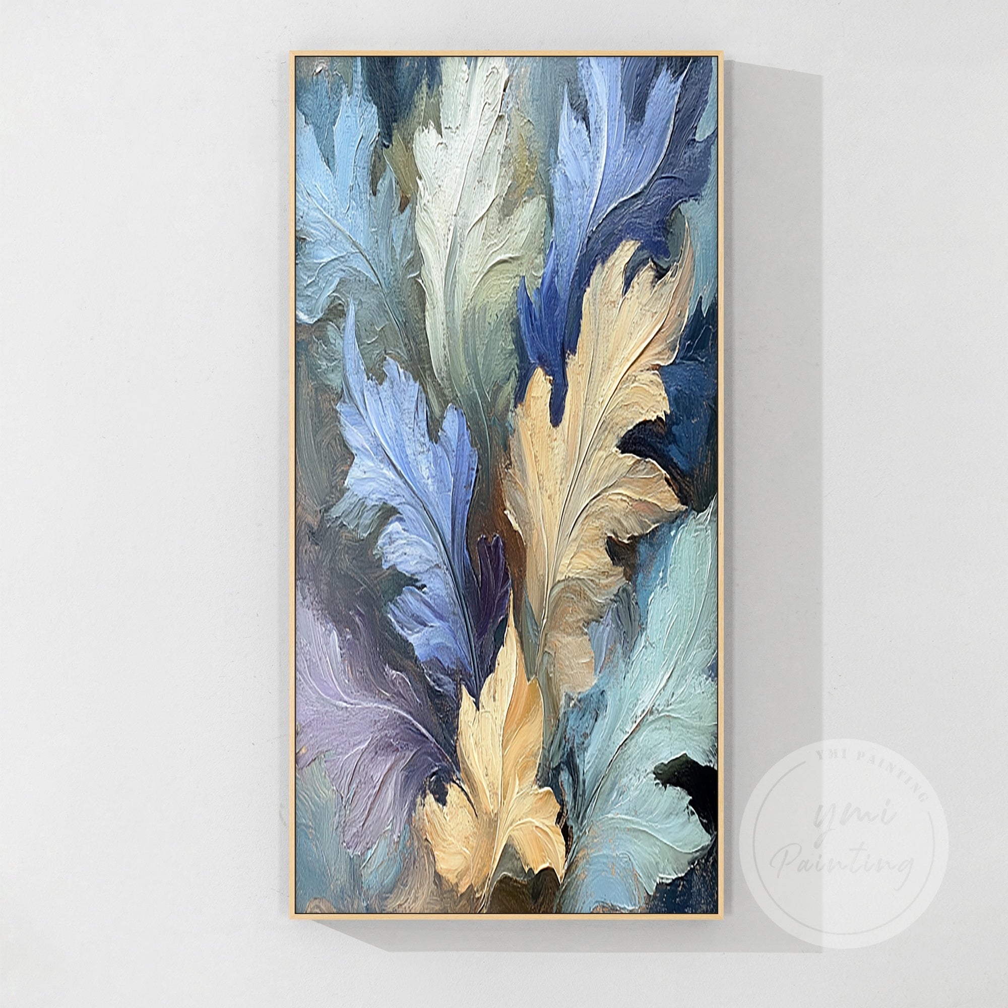 Nature-inspired autumn leaves wall art in rustic colors of blue, yellow, and purple, perfect for fall decor in a wooden frame