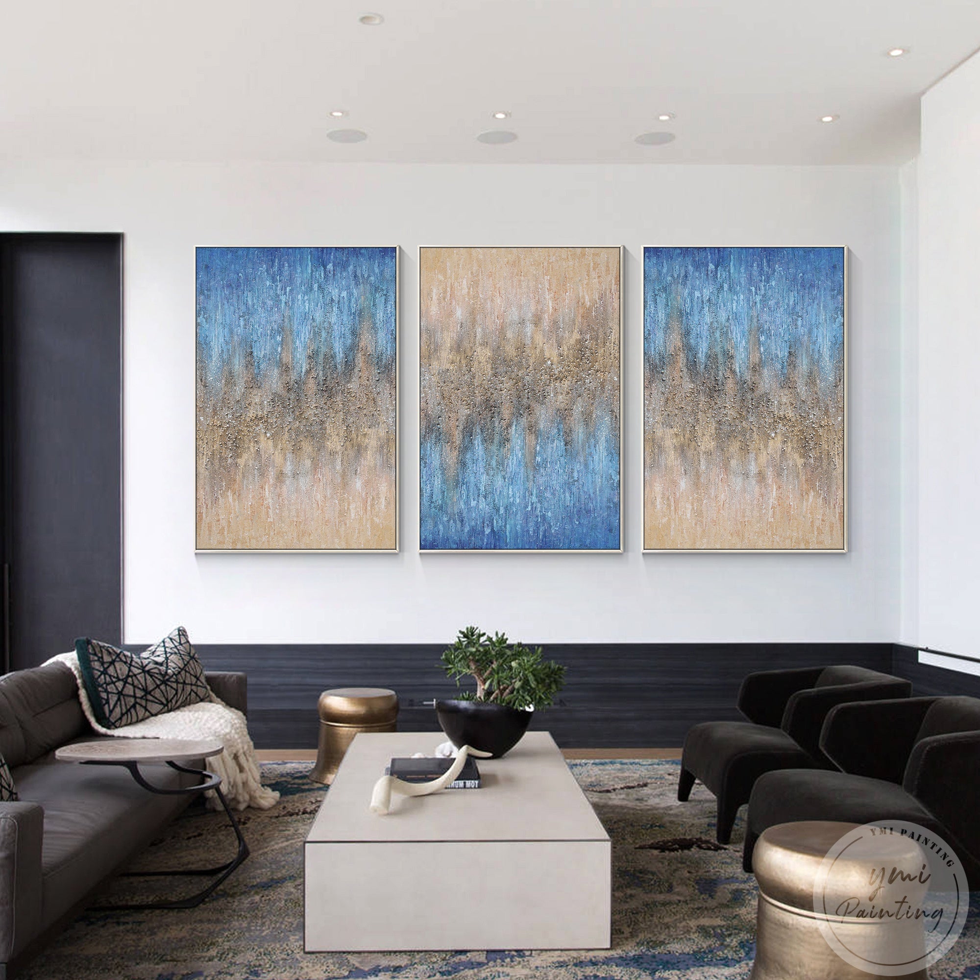 3-piece abstract art set with a sophisticated blend of beige, blue, and gold, featuring crystal stone accents in a modern living room.