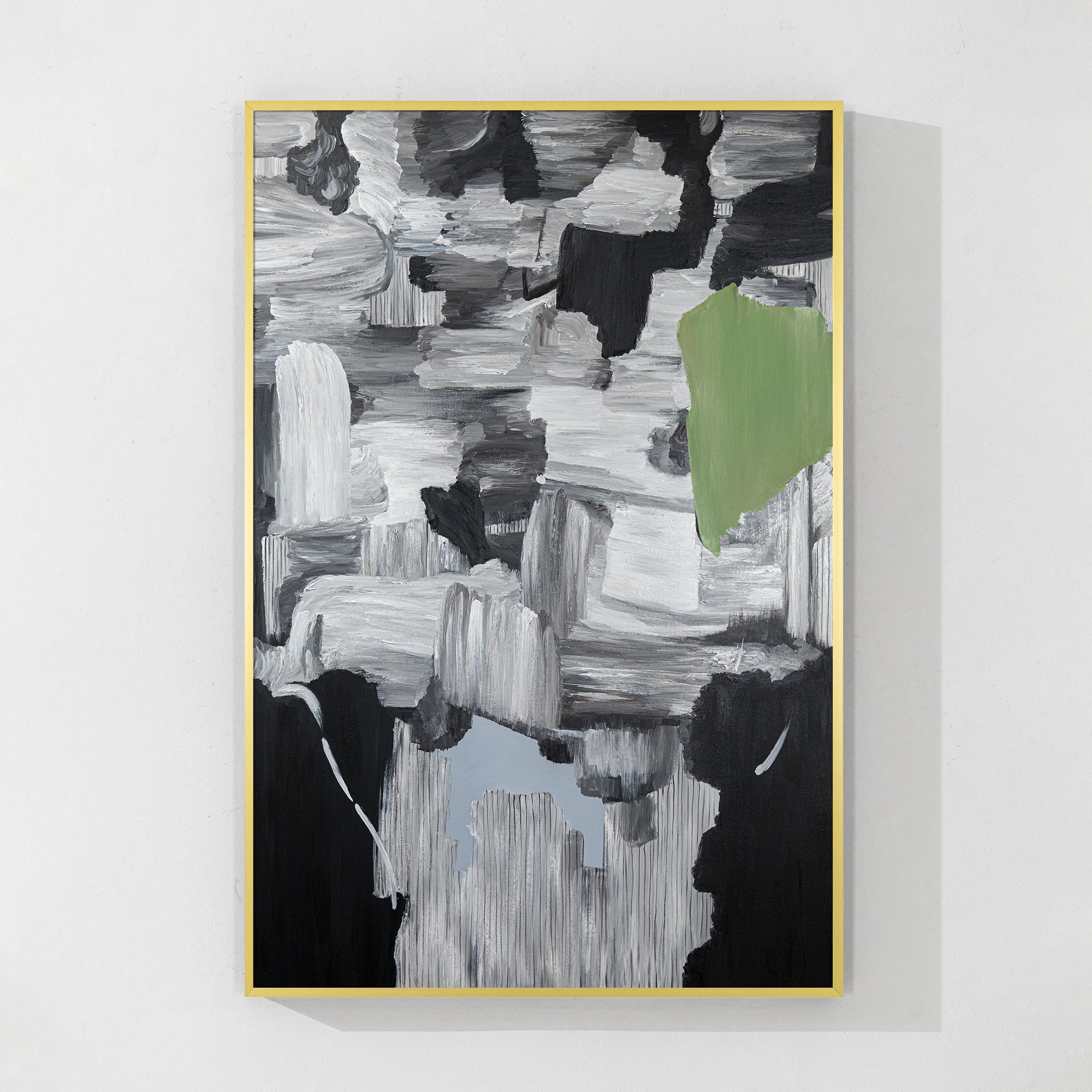 Minimalist artwork with gray fog and green hope symbols in a gold frame