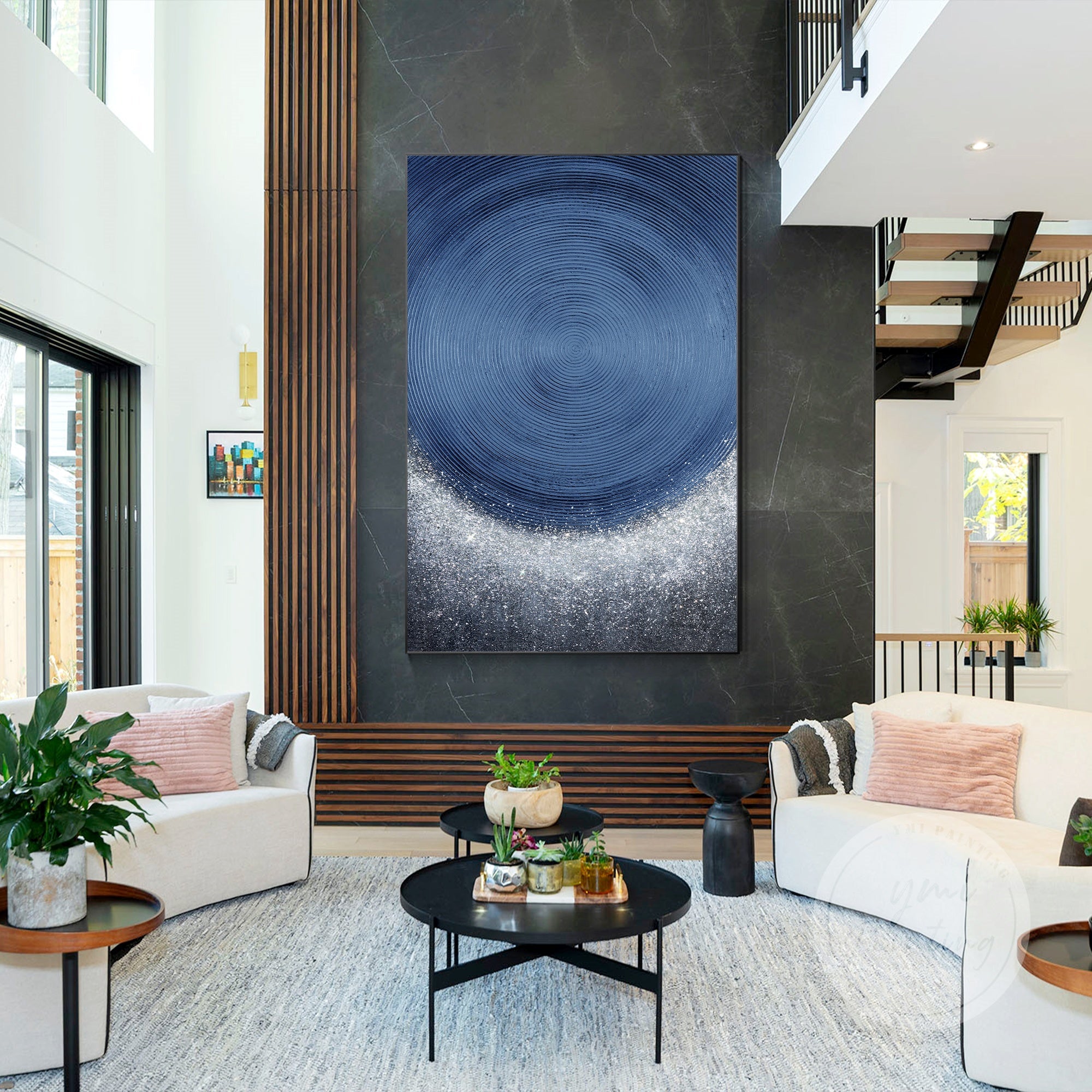 Abstract blue spiral brush strokes painting with glitter.