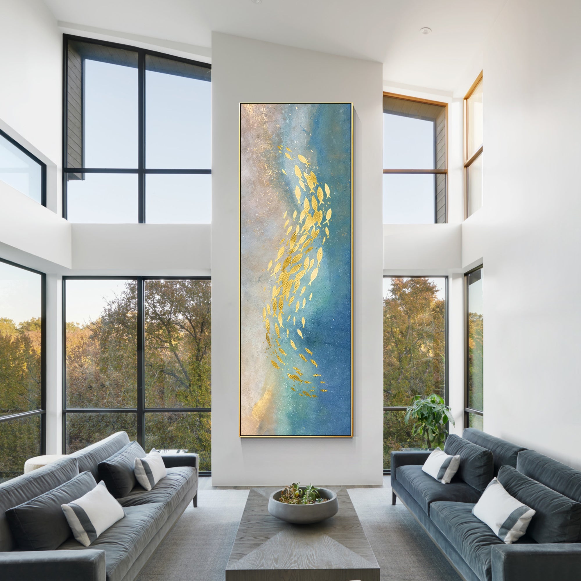 Abstract fish artwork with gold fish details and a two-tone champagne blue background.