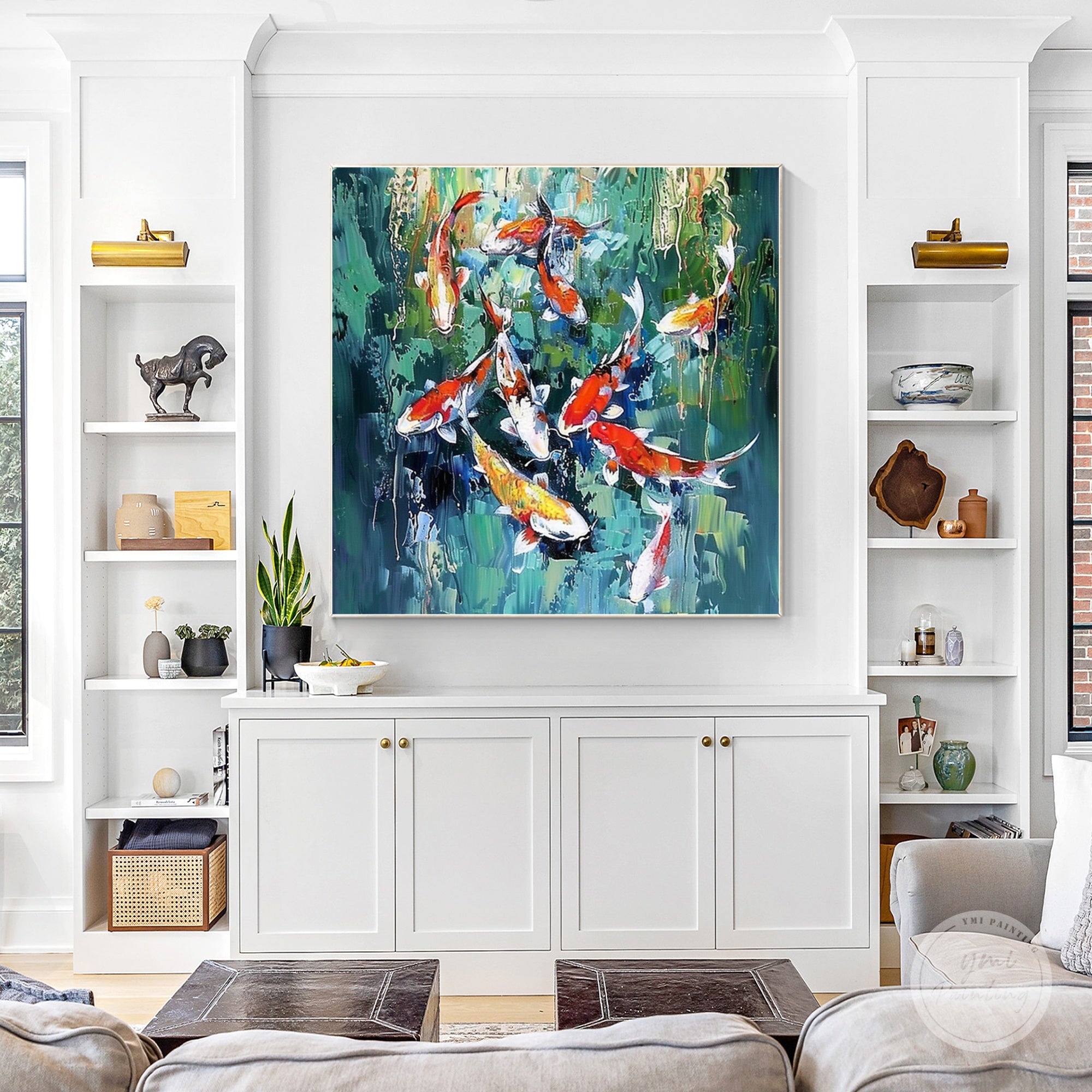 Textured abstract koi fish painting hung in a contemporary living room setting.