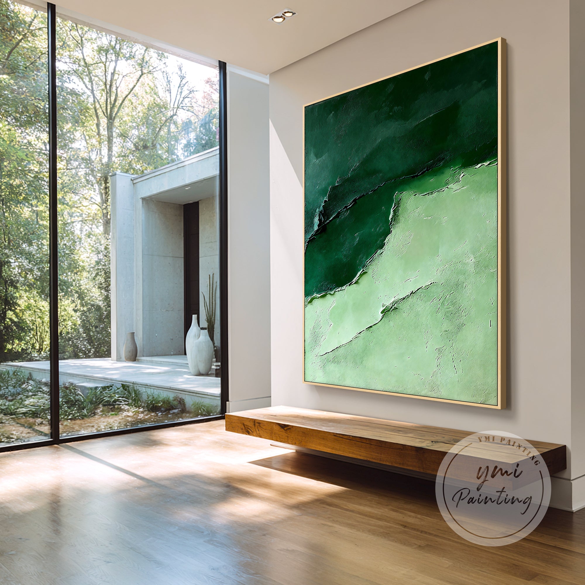 Minimalist emerald green textured wall art as focal point in living room.