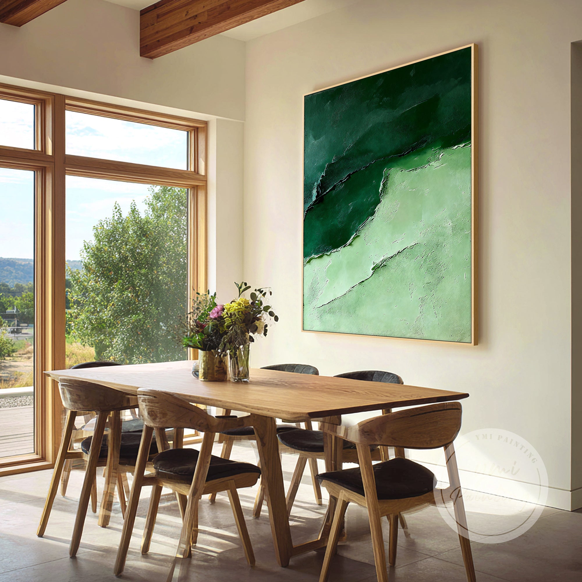 Textured emerald green artwork in a modern hallway interior.