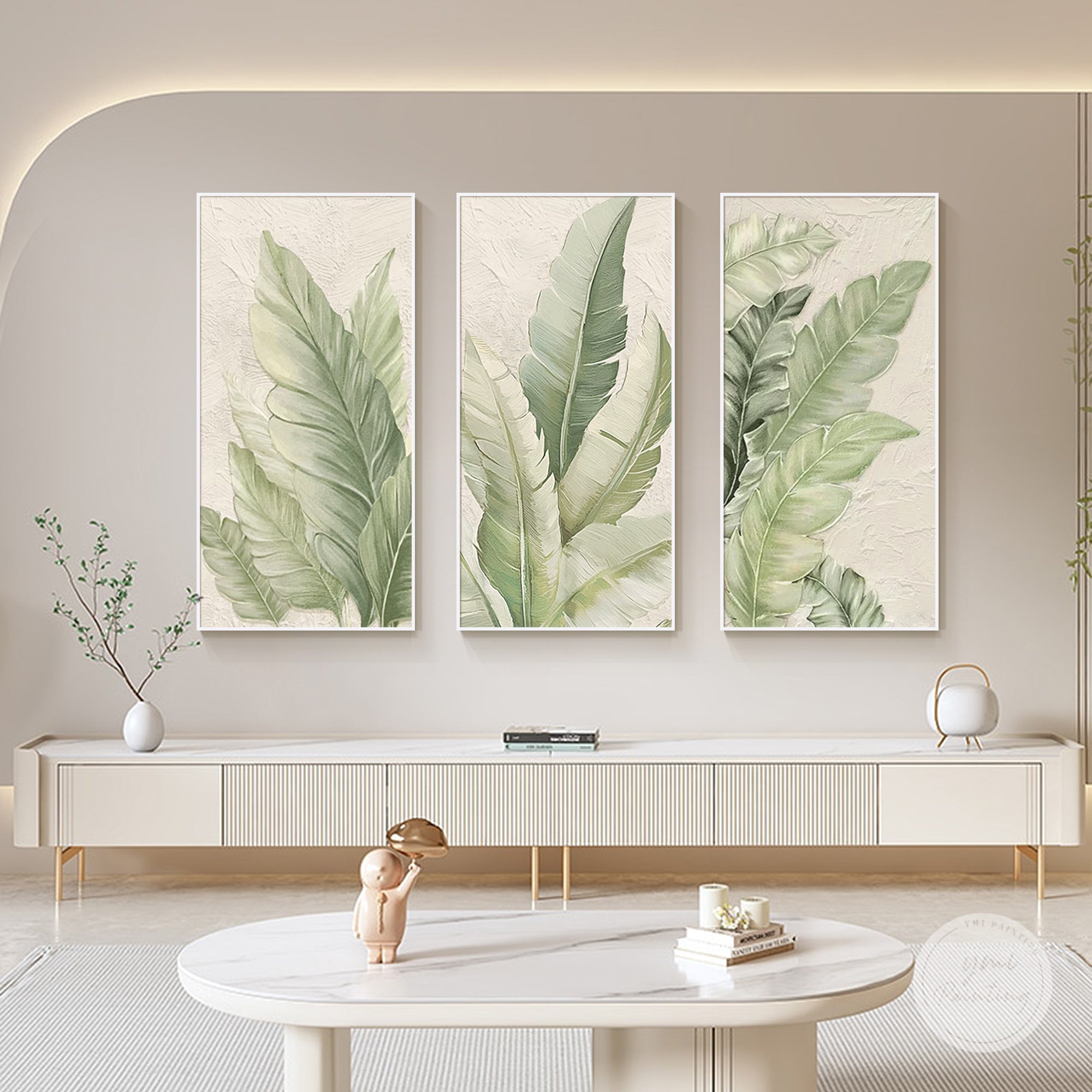 Tropical greenery wall art set above a living room sideboard