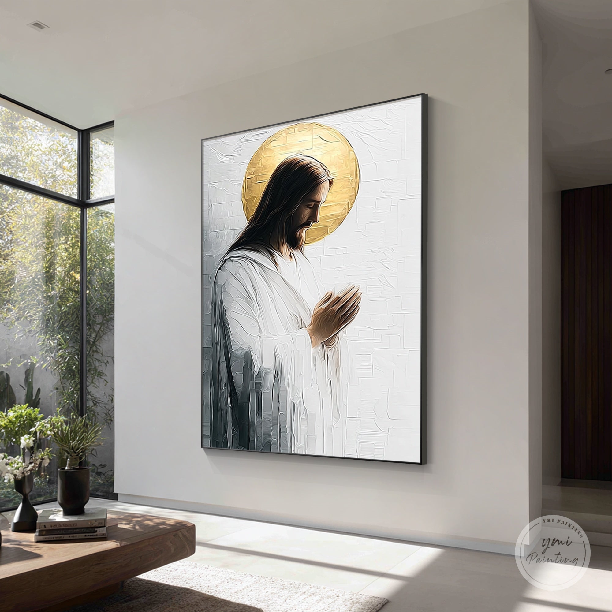 Quadro su tela di Gesù in preghiera esposto in un soggiorno moderno che crea un'atmosfera spirituale e pacifica.