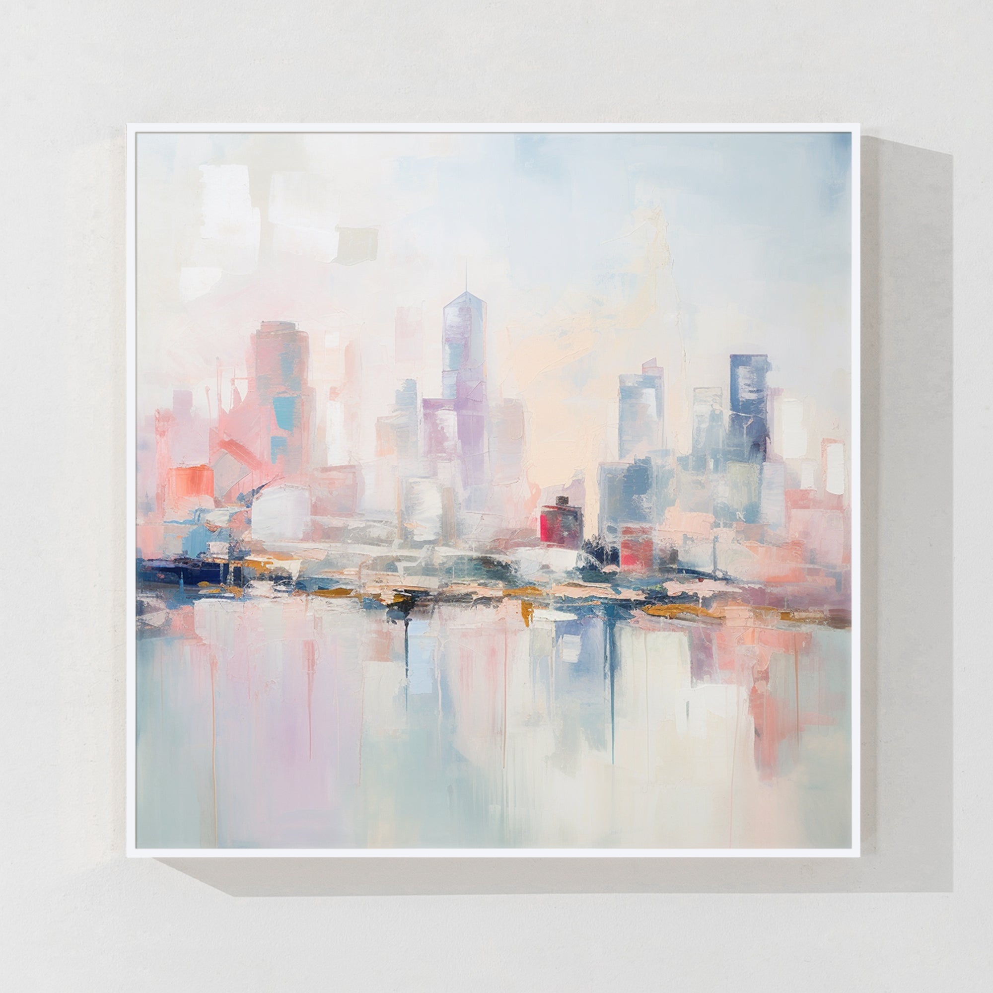 Framed pastel city wall art, showcasing a beautiful cityscape with soft pink and blue tones, perfect for contemporary home or office decor.