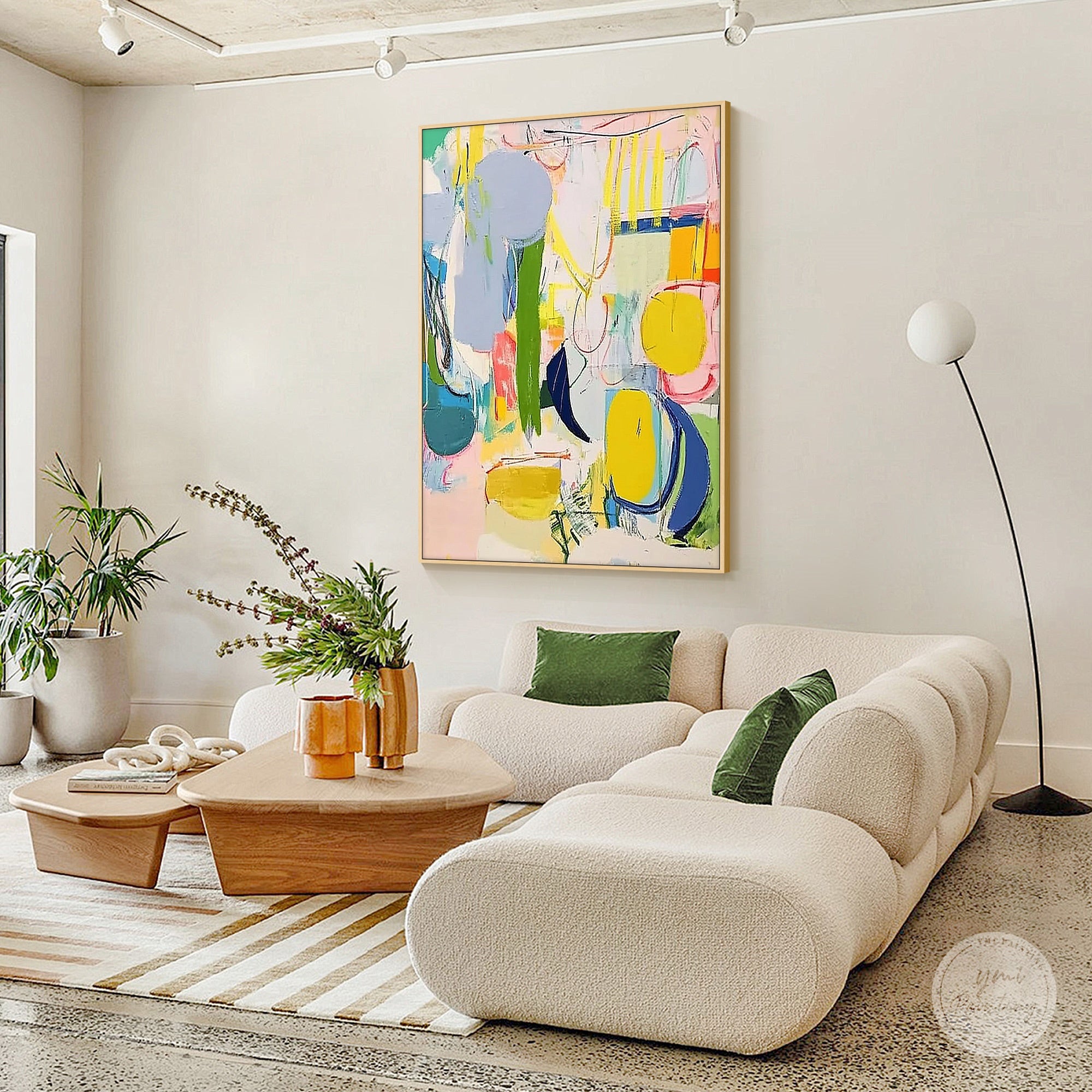 Multicolour abstract wall art featured on a contemporary living room wall