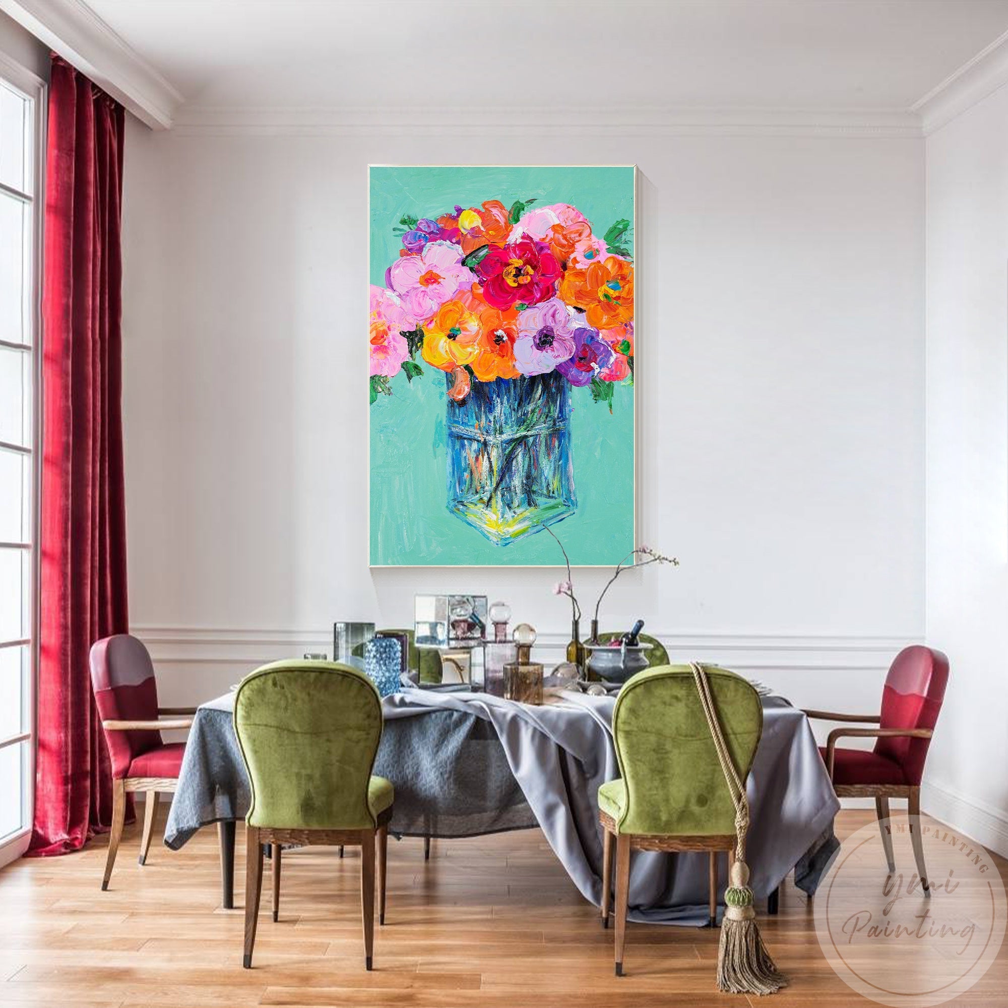 This floral painting with a mix of pink, orange, and green hues adds personality and charm to a chic dining room.