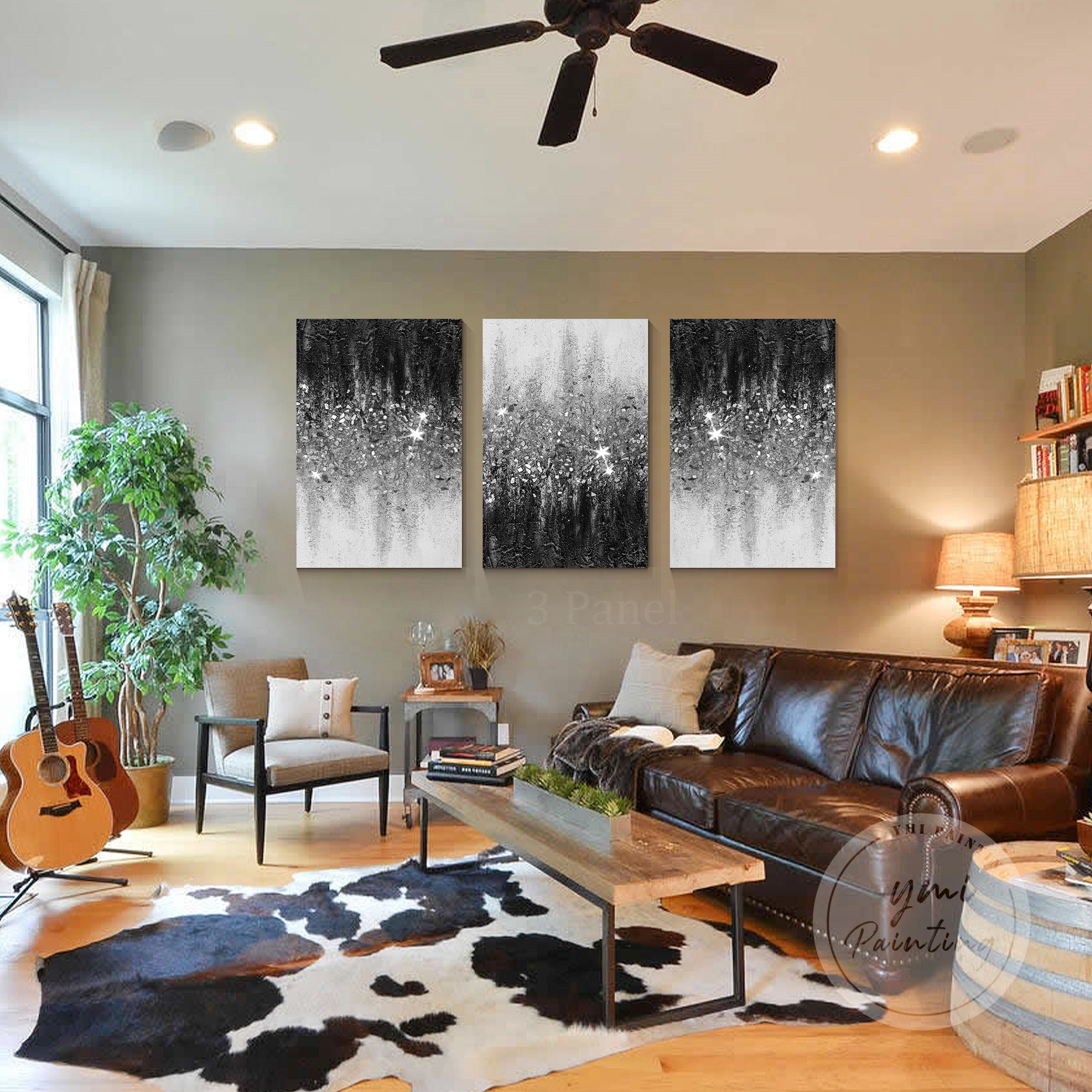 Elegant black and white gradient artwork with glittery texture in middle-century style living room.