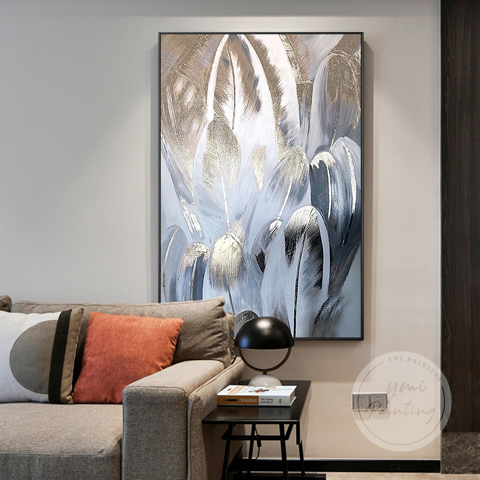 Hand-painted feather artwork with rose gold highlights, framed and ready to hang for luxurious home decor.
