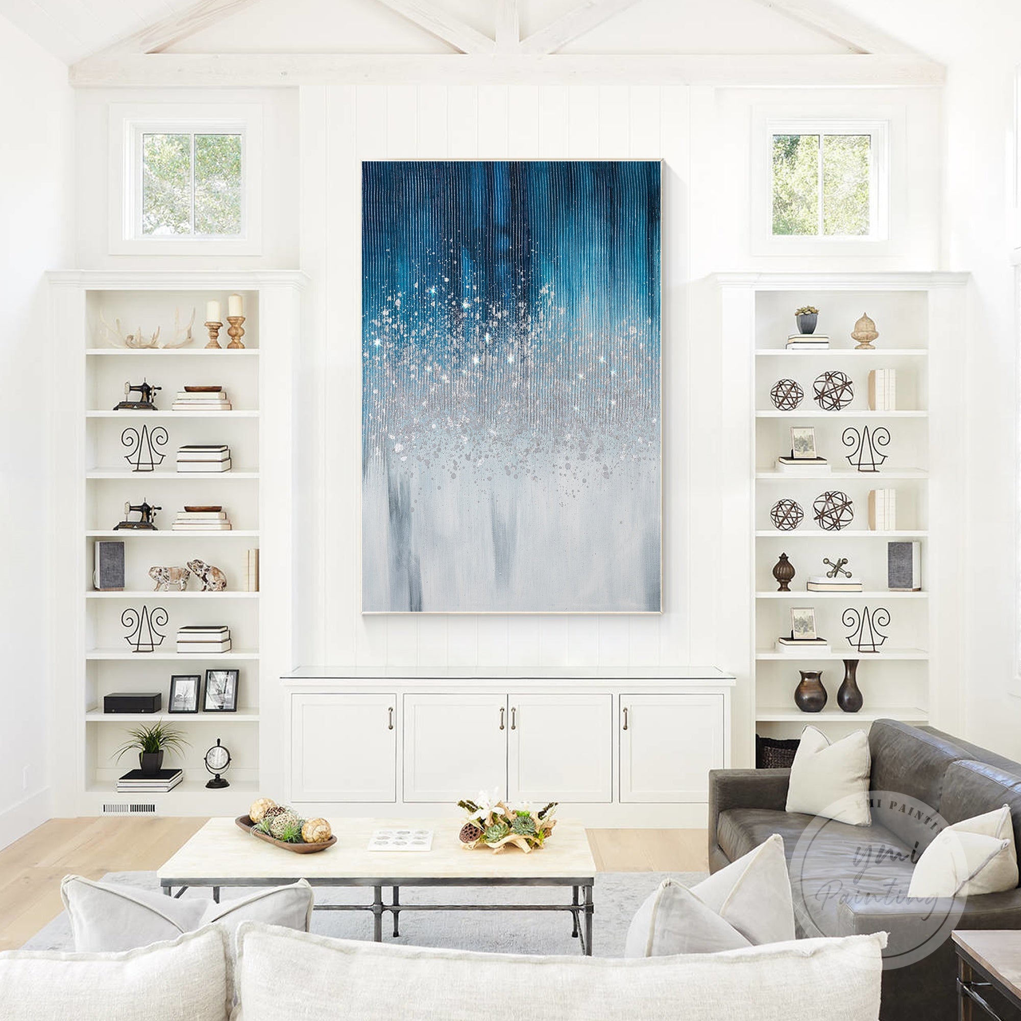 Textured silver leaf glitter painting in navy blue tones, creating a sophisticated and elegant focal point.