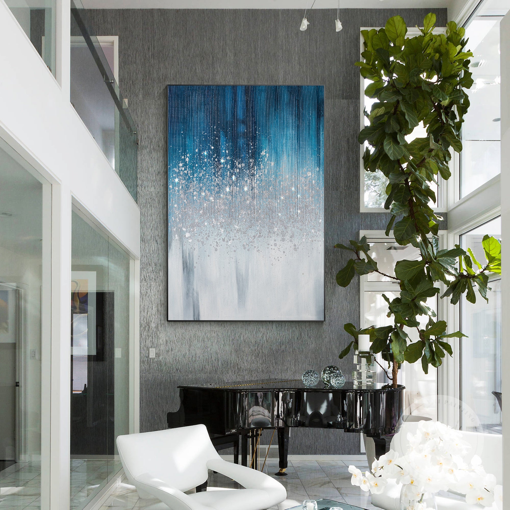Navy blue minimalist painting with silver glitter details, adding texture and depth to modern walls.