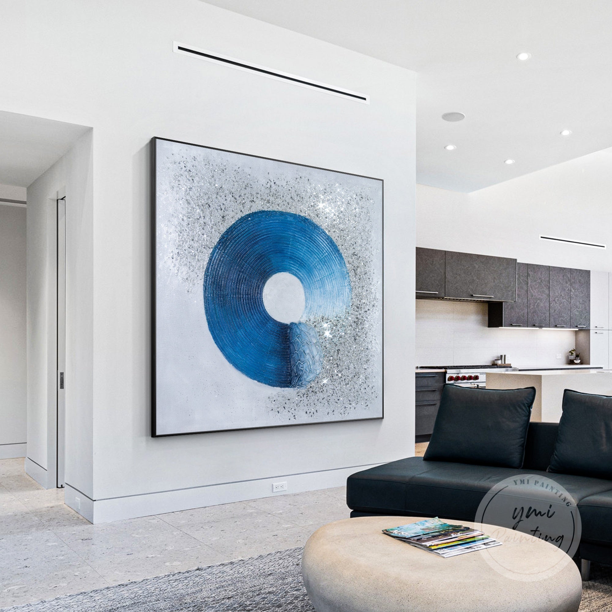 Blue and silver glitter canvas with textured crushed glass, creating depth and shine in artwork.