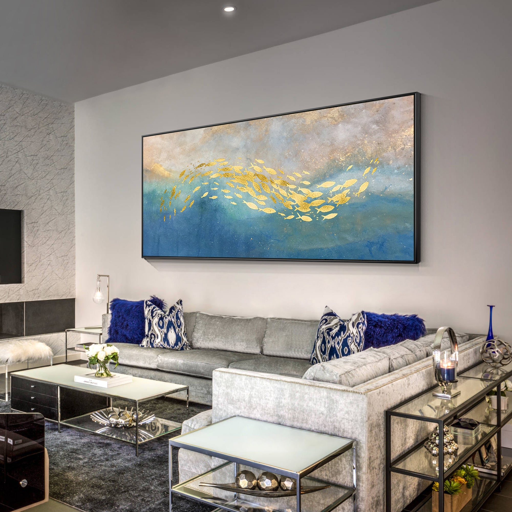 Abstract fish canvas featuring golden fish forms and a softly blended champagne and blue glitter surface.