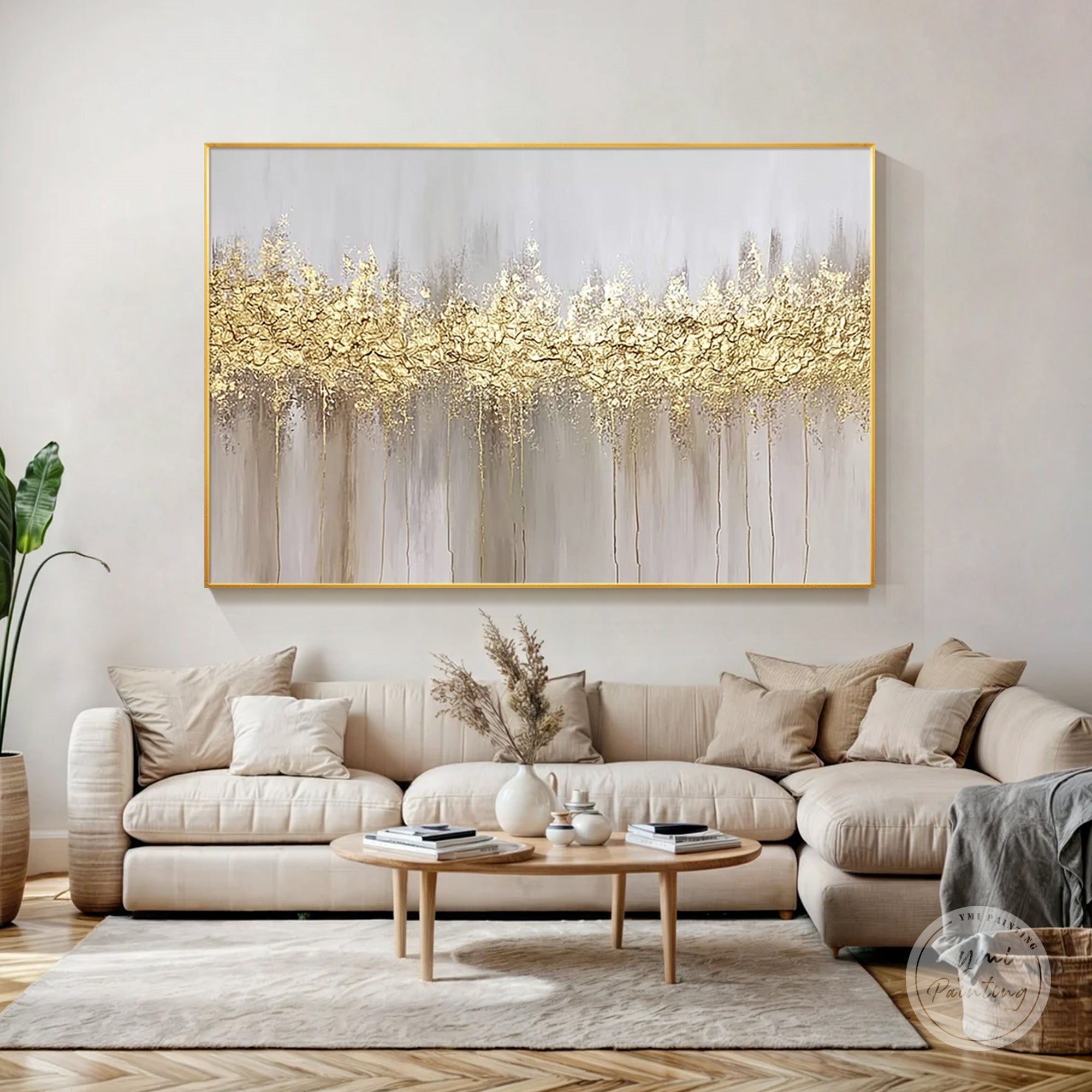 Textured abstract gold wall art with soft neutral background featured in a living room setting.