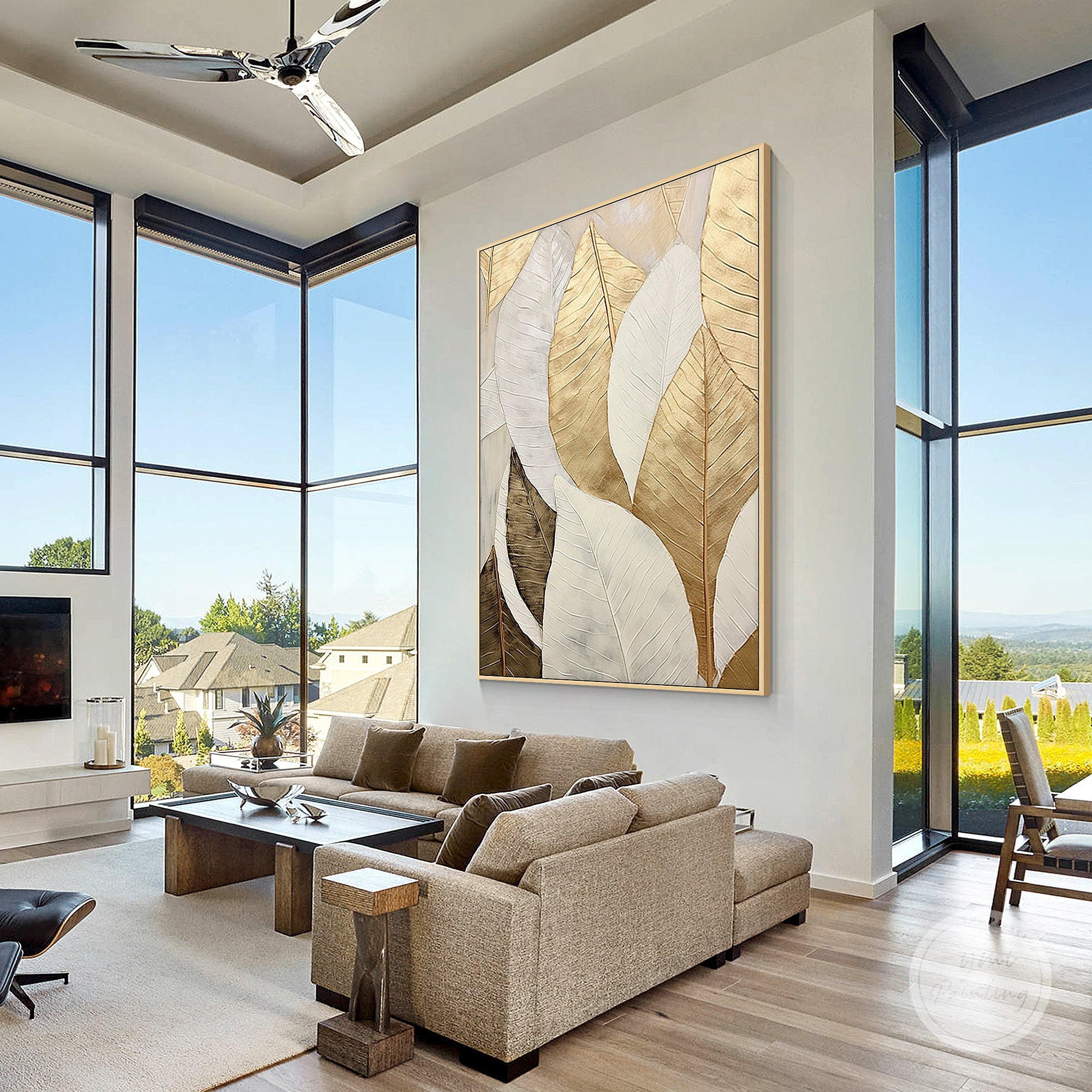 Gold and white leaf canvas wall decor in a contemporary living room
