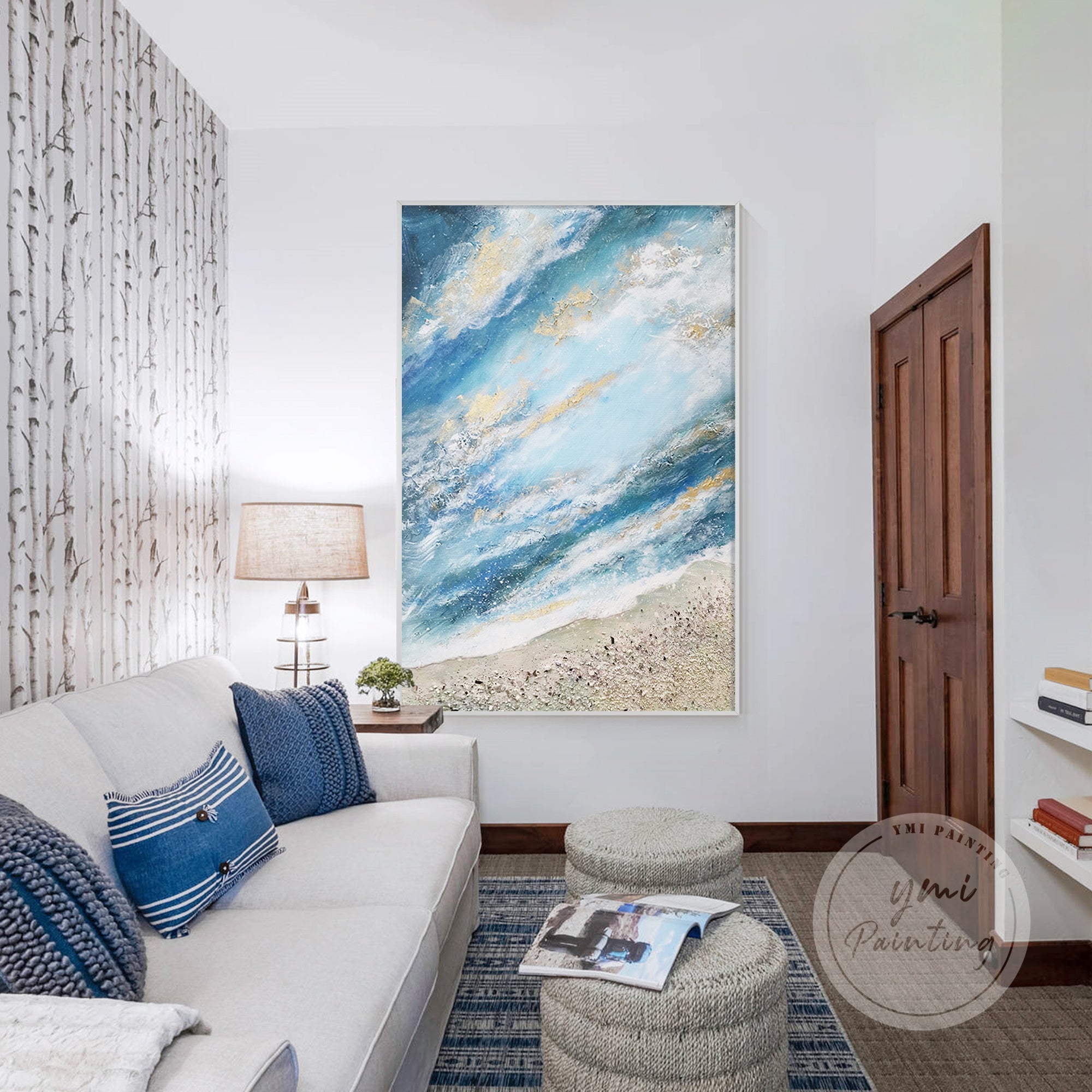 This textured beach painting blends light blue hues and gold accents, offering a warm and tranquil touch to your living space.