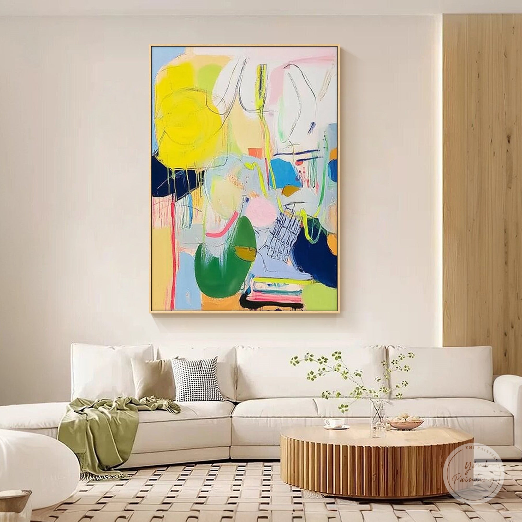 Abstract modern wall art in large size featured above a living room sofa