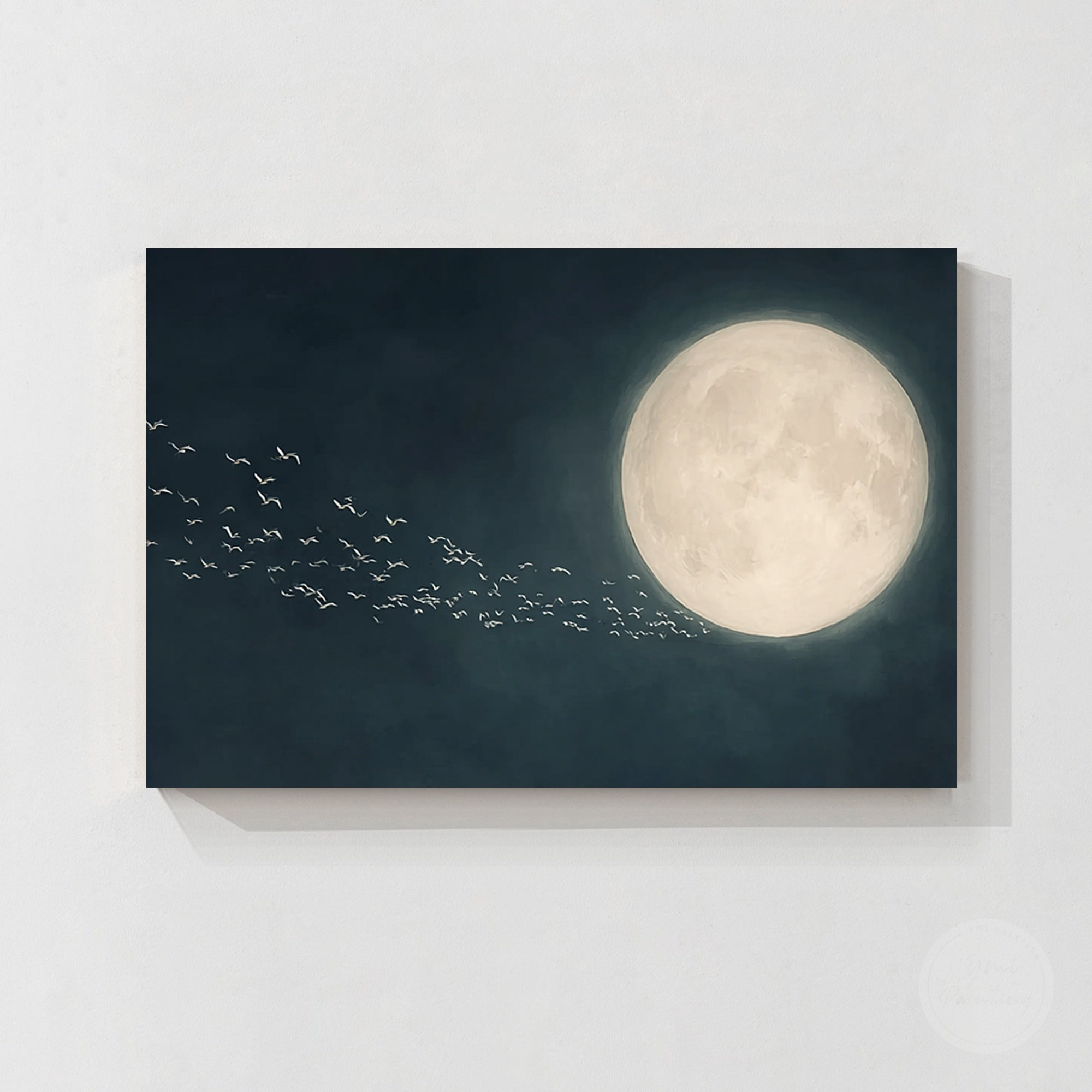 Dark blue celestial wall art with glowing moon