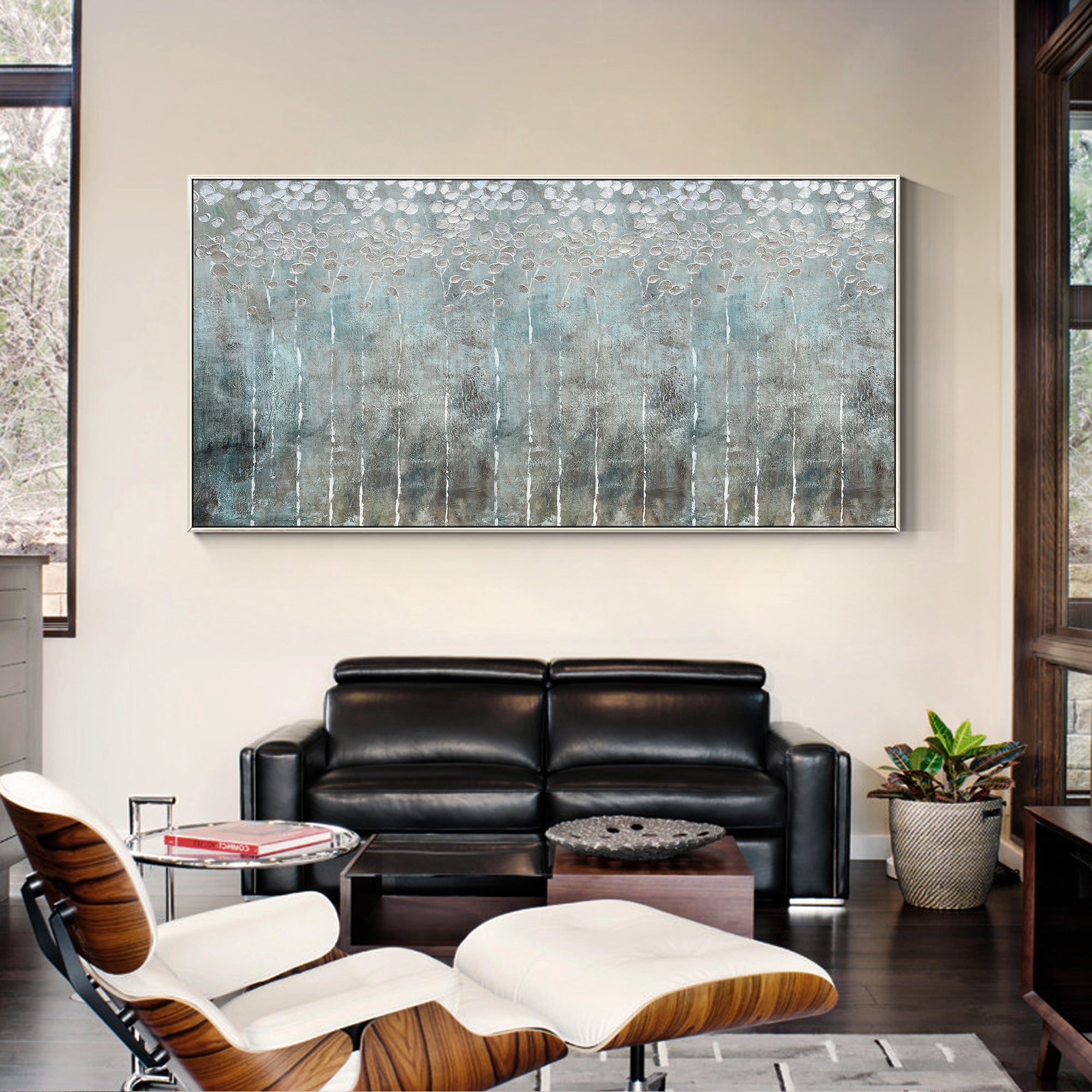 Modern abstract painting combining gray and silver tones with hand-applied textured layers