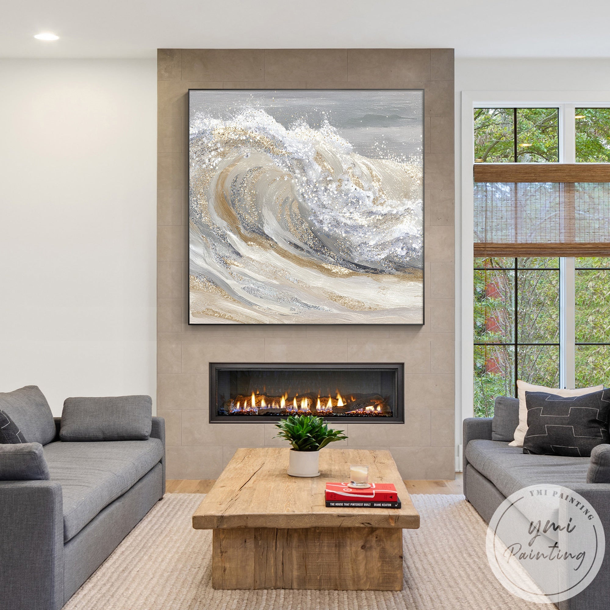 Large abstract seascape artwork above sectional sofa in contemporary home decor