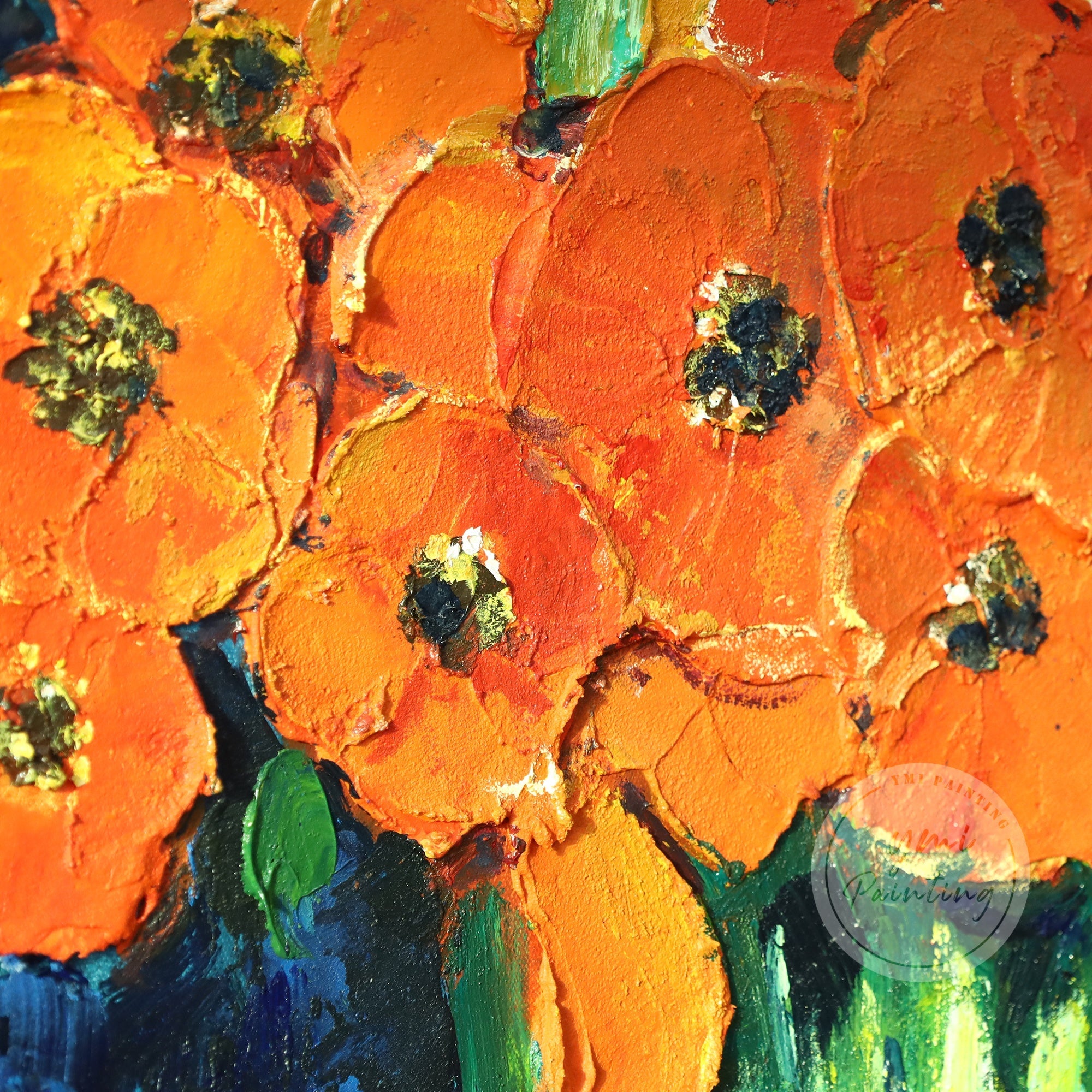 This modern floral artwork with bold orange flowers and a cool blue background creates a striking visual impact, perfect for contemporary spaces.