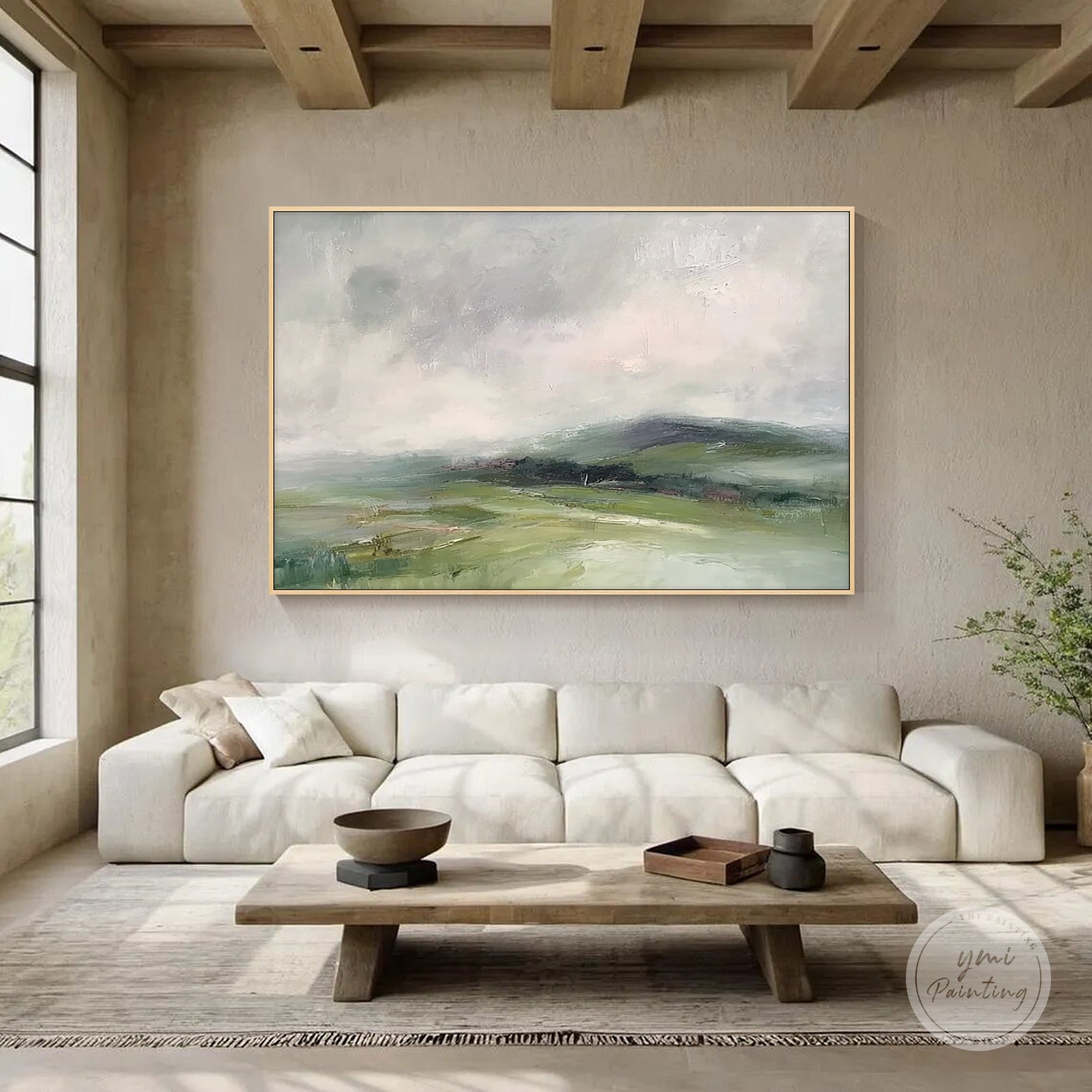 Hand painted abstract green landscape wall art in a minimalist living room interior