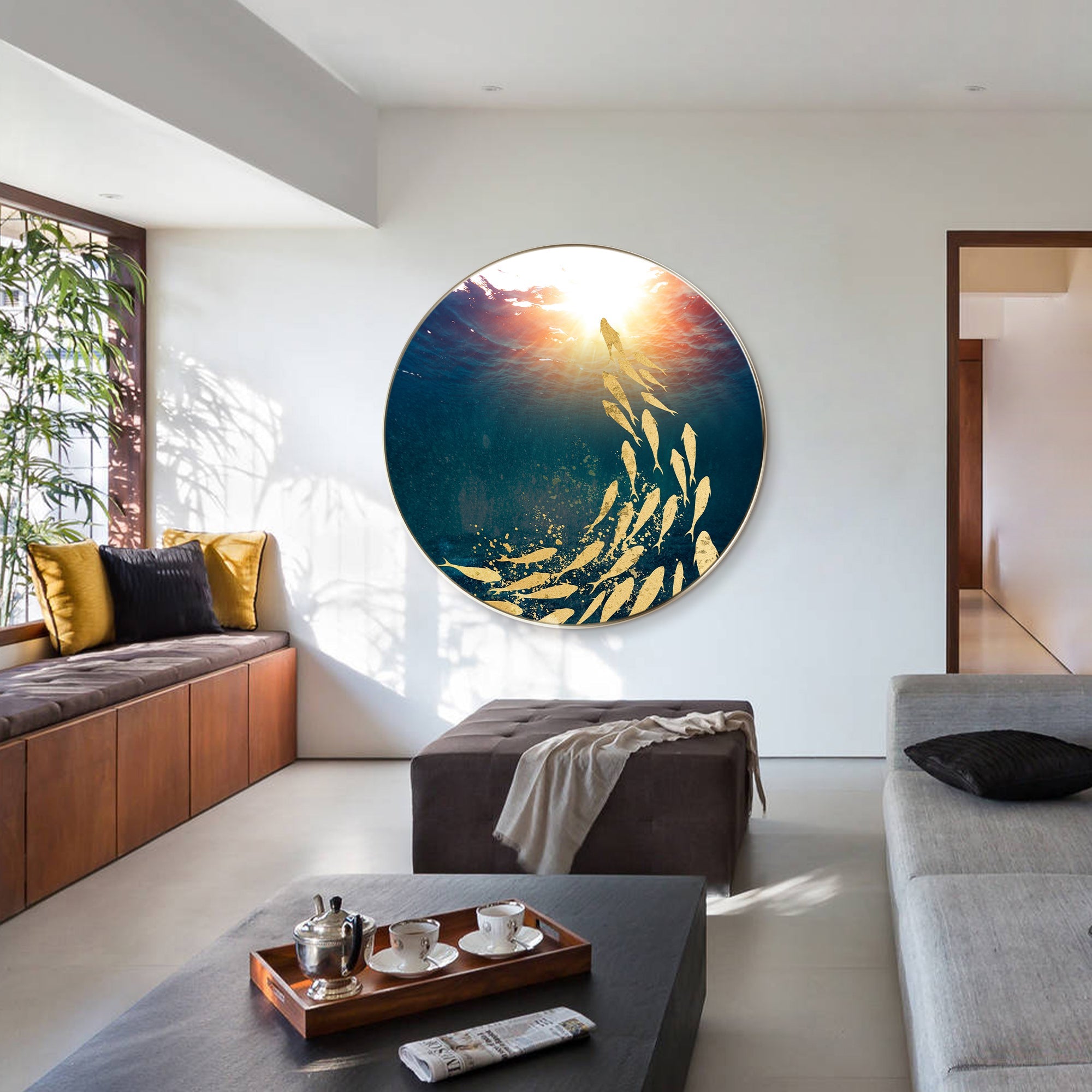 Navy blue ocean wall art with sponge wave texture in a bright living room