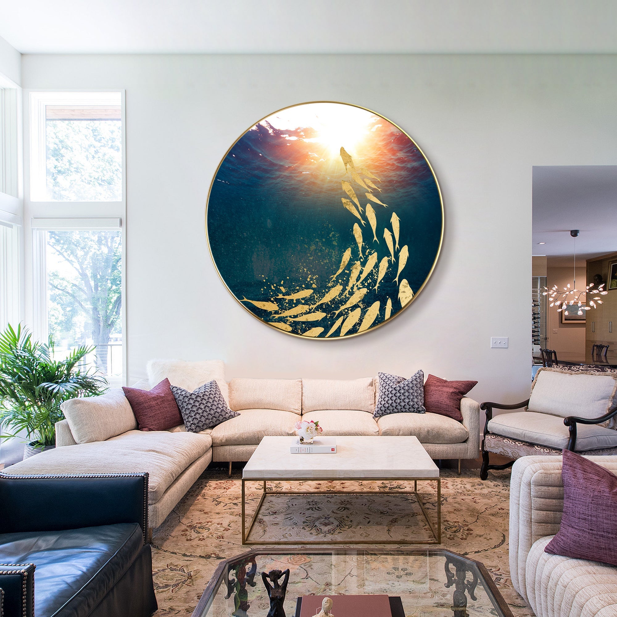 Abstract gold fish ocean painting styled above a living room sofa