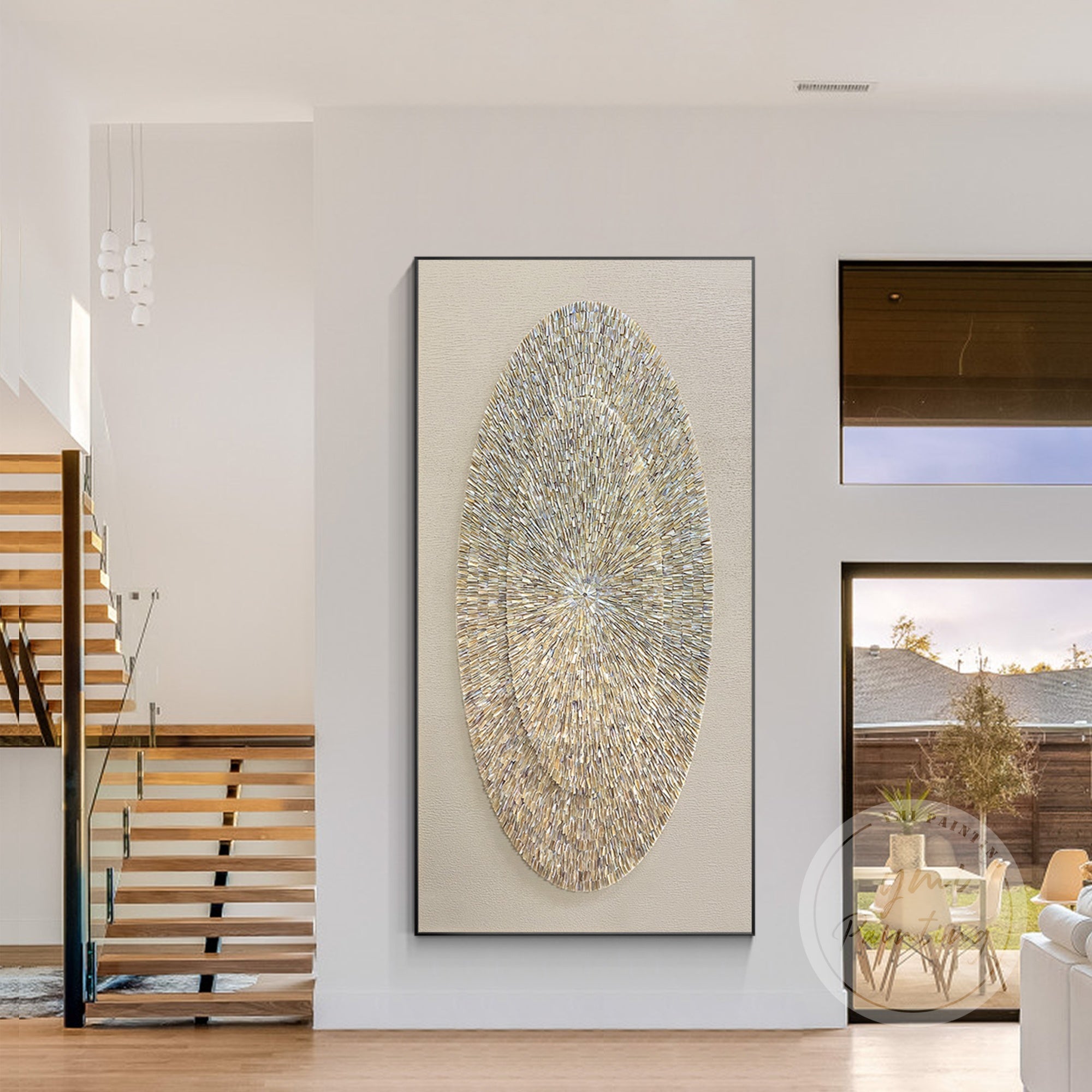 Oval oyster shell wall art in warm taupe and beige tones.