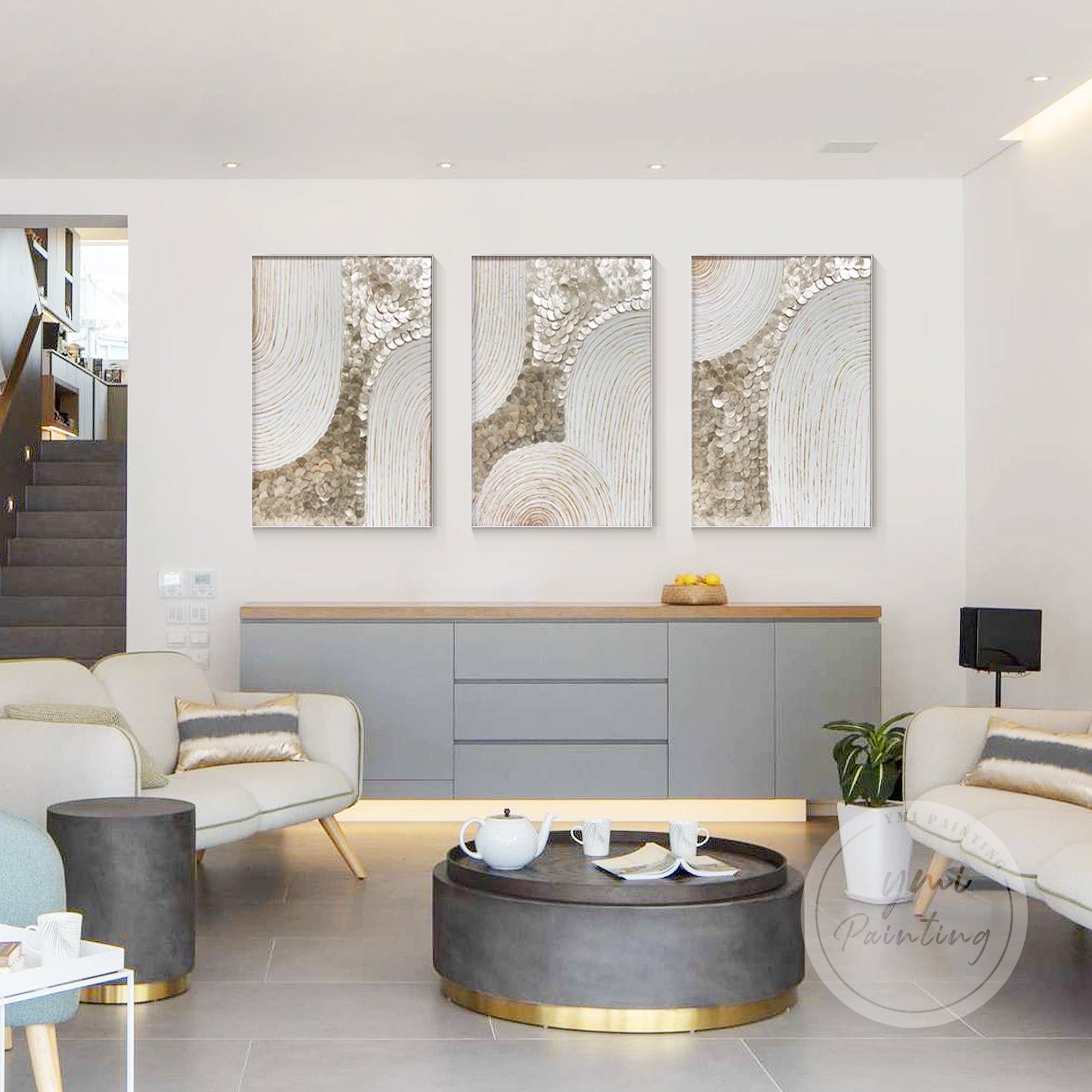 Large shell art ideal for stairwells and office lobbies, this three-part wall art collection brings luxury and sophistication to any space.