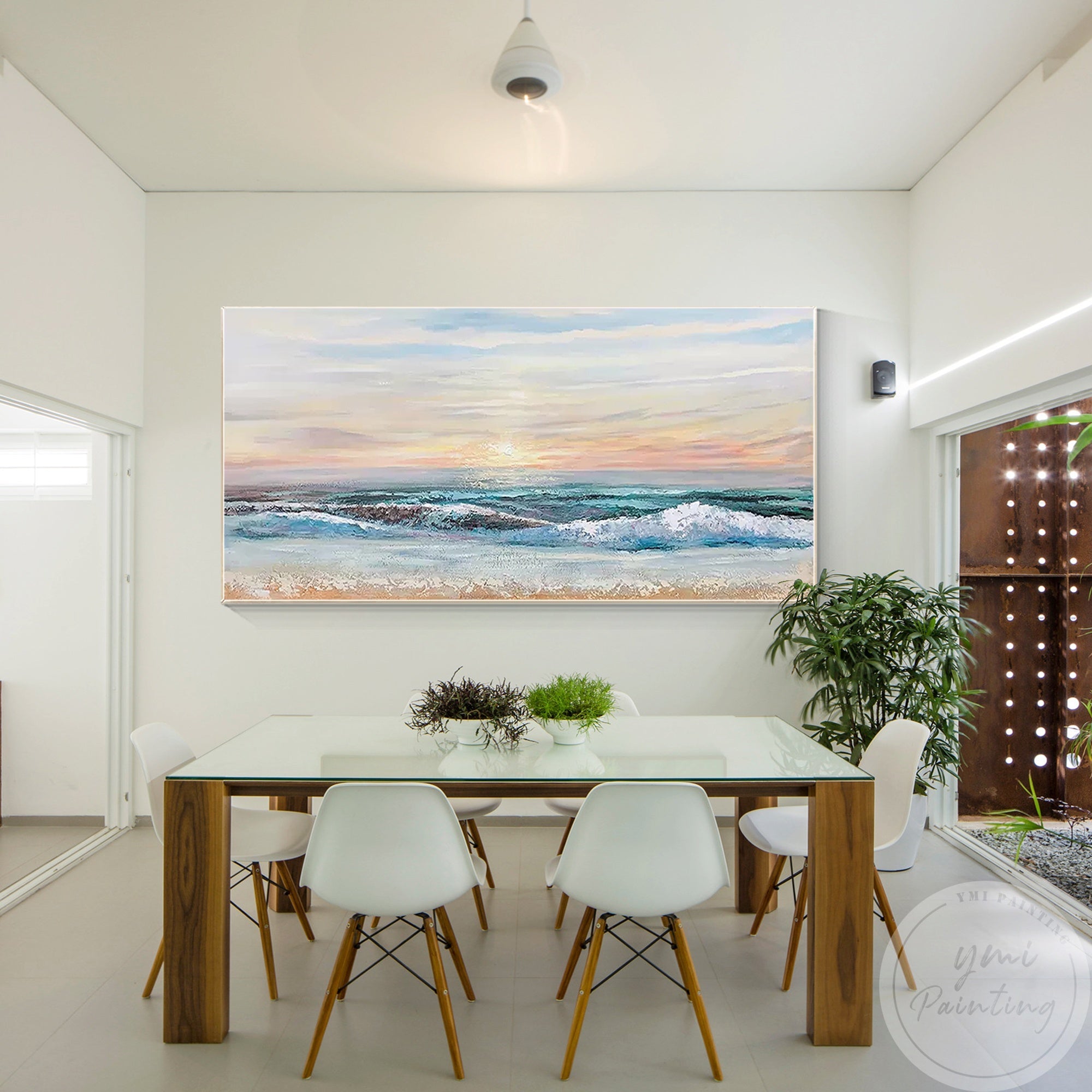 A minimalist beach sunset in soft pastel tones brings a soothing, peaceful atmosphere to modern space with its panoramic view.
