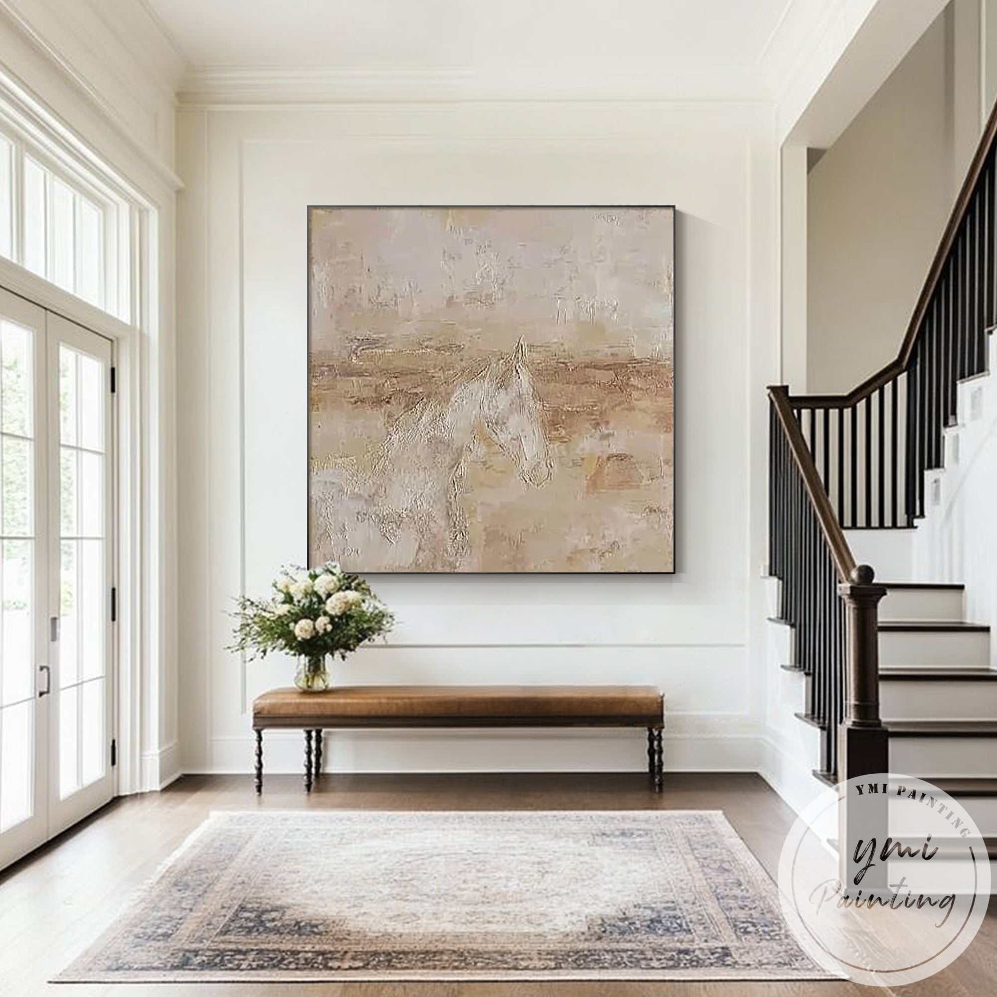 Neutral abstract horse painting in bright airy living room with soft lighting