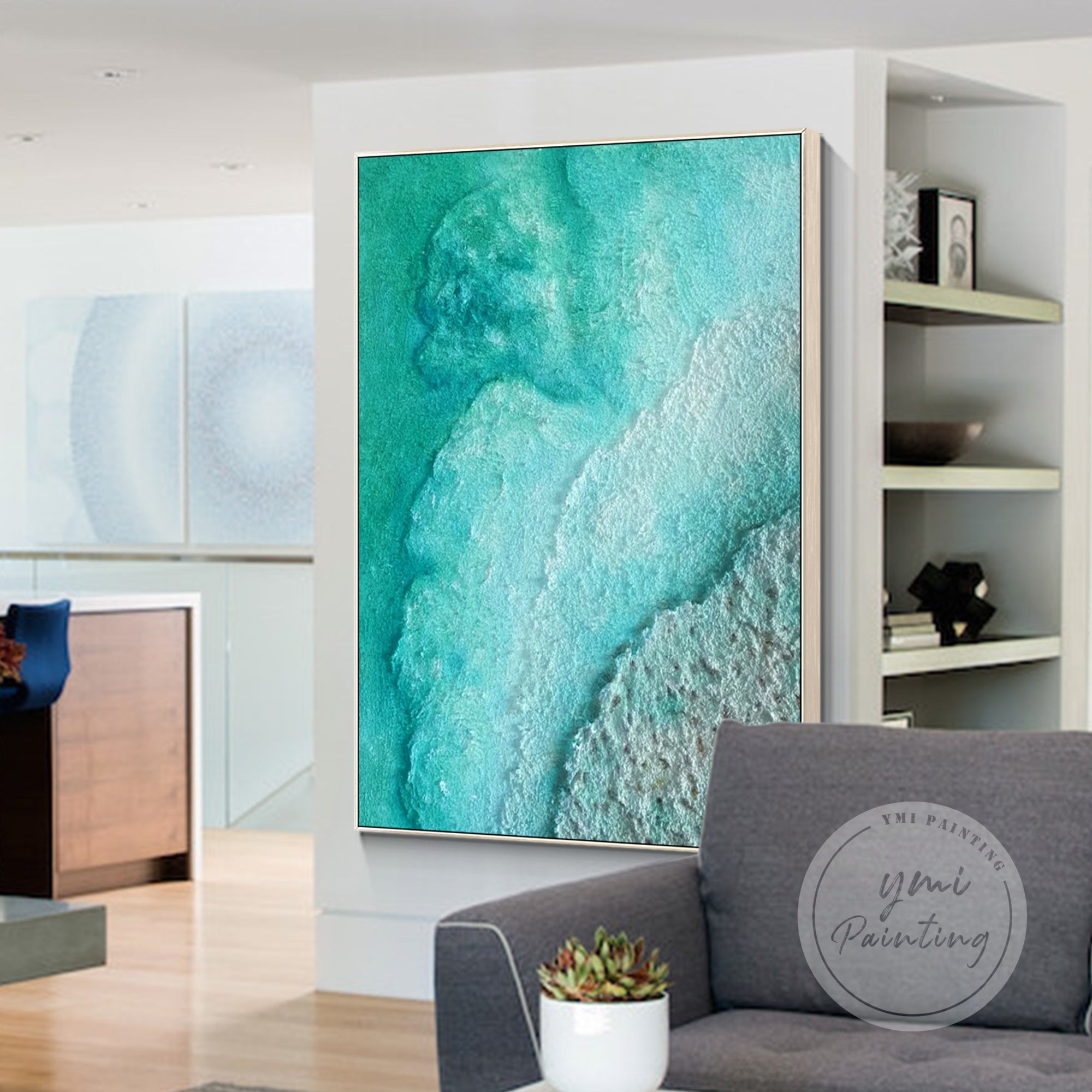 Large framed original oil painting featuring turquoise green beach waves and textured sand, designed to add tranquility and style to any room.