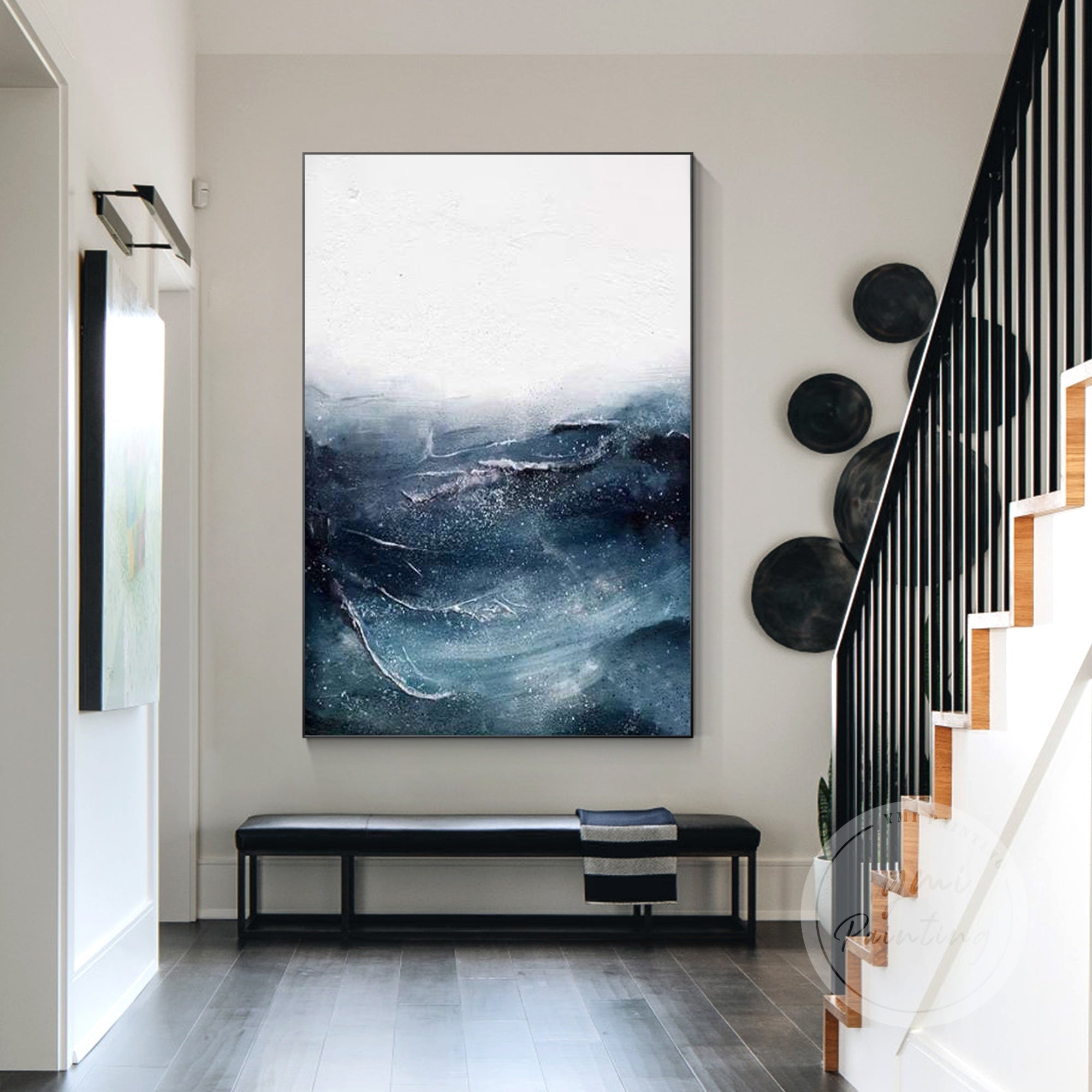 Blue beach painting with textured waves and serene ocean hues on canvas.