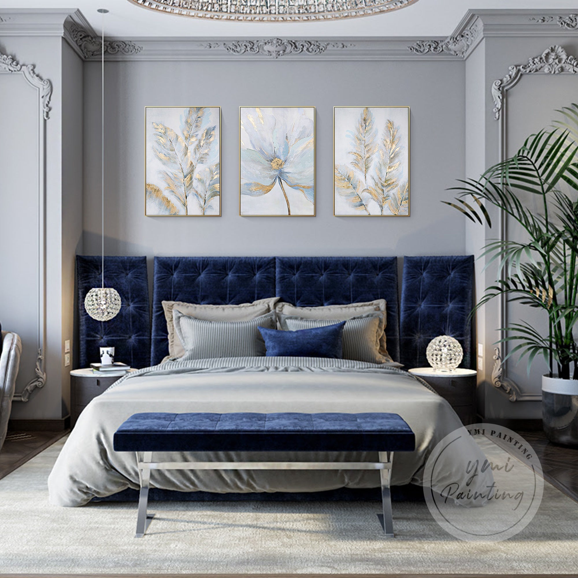 Floral artwork with gold and silver leaf on clean white background above along home sofa