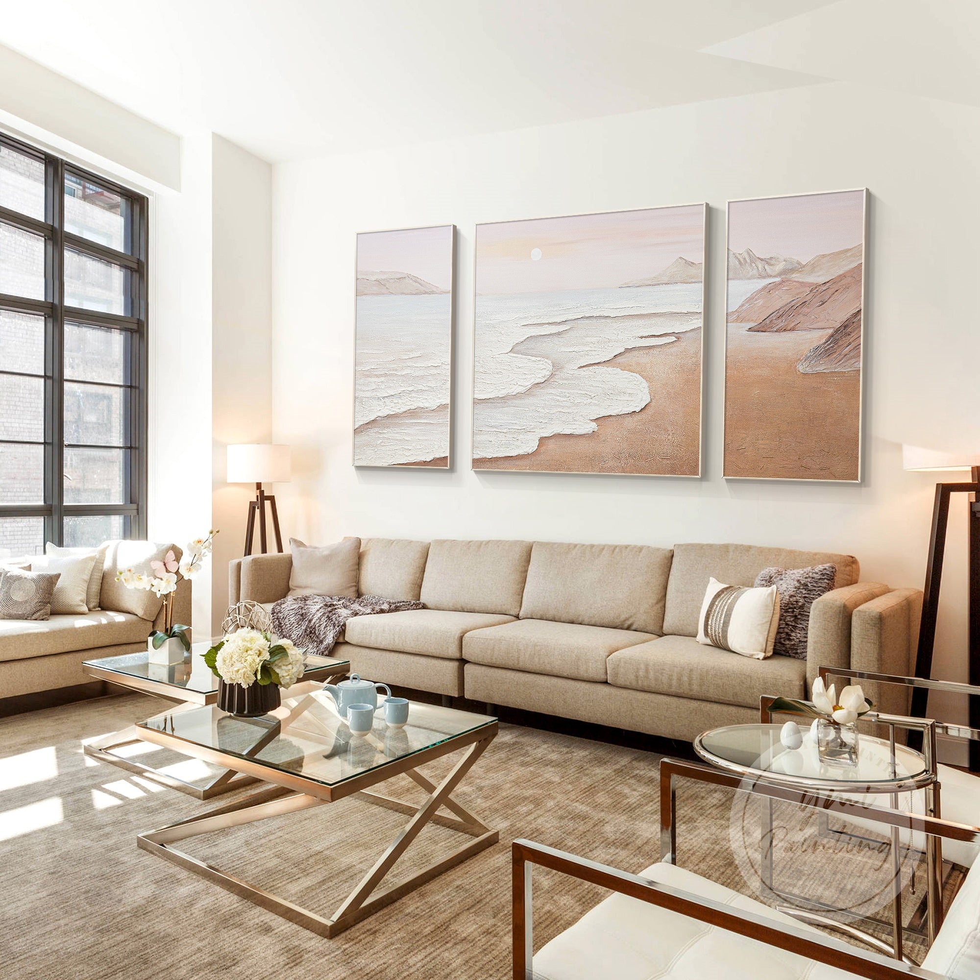 Set of 3 beach painting, with rolling hills and a tranquil pink sunset, adds a sophisticated coastal touch to living space.