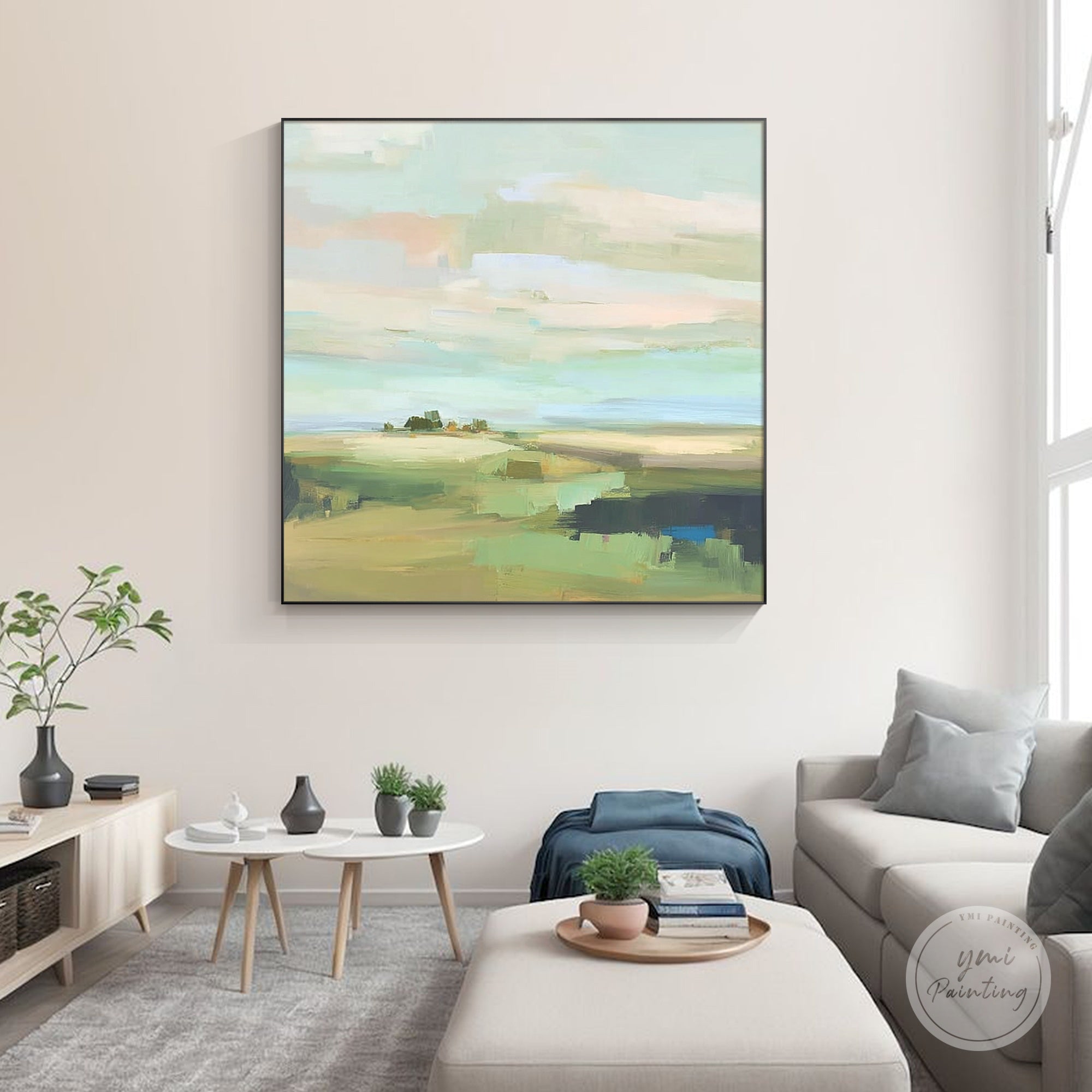 Square abstract landscape wall art in soft pastel tones for a living room