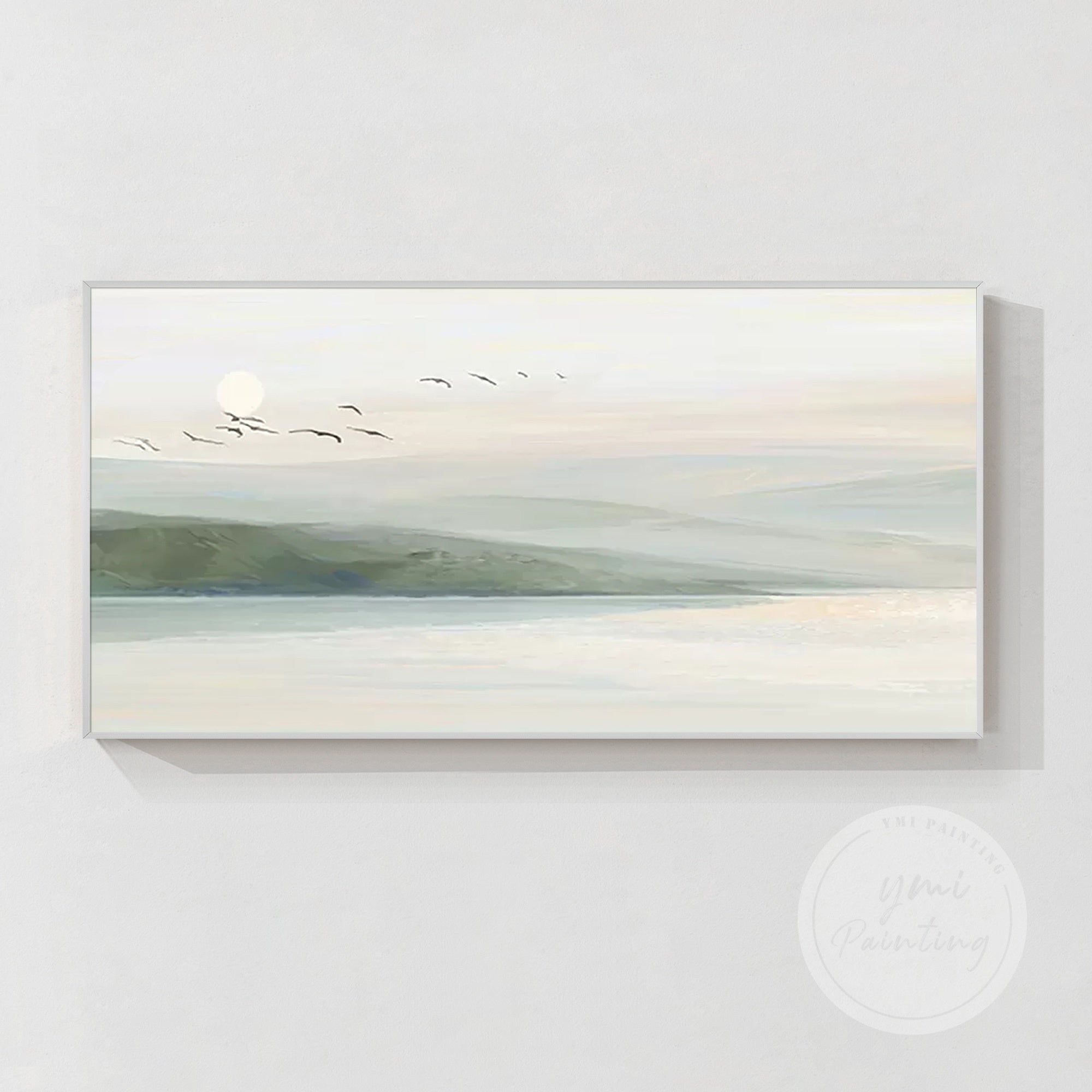 Minimalist art featuring rolling hills and calm waters, with birds flying in a peaceful sky in a silver frame.