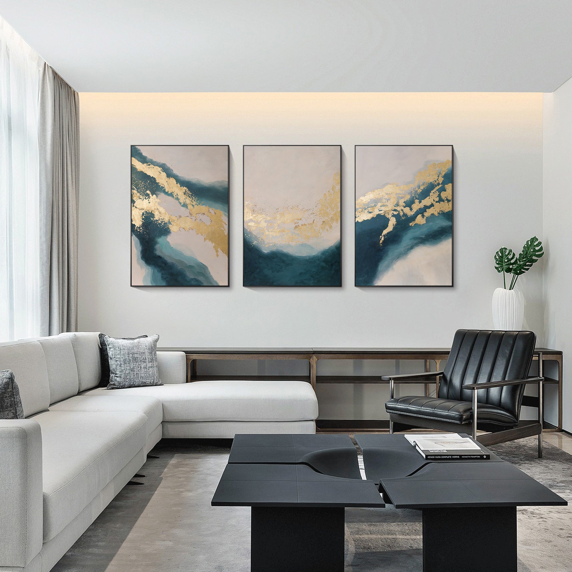 Three panel turquoise gold abstract painting styled on a living room wall
