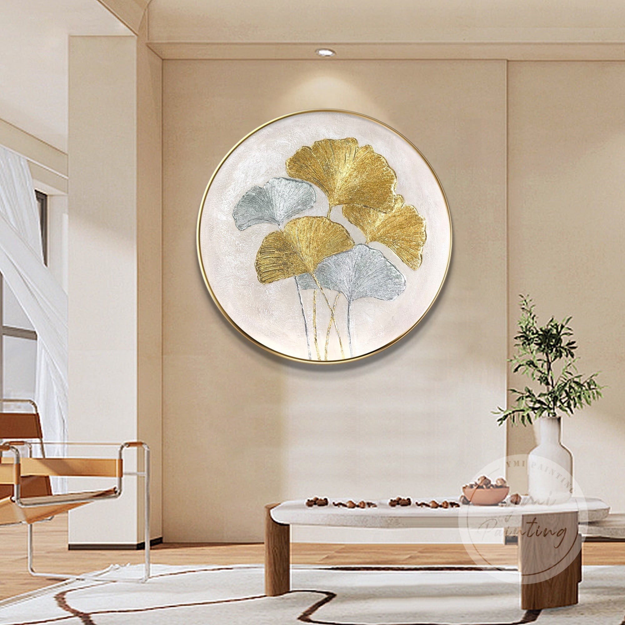 Elegant ginkgo biloba round wall art, featuring metallic gold leaves on a neutral abstract background.