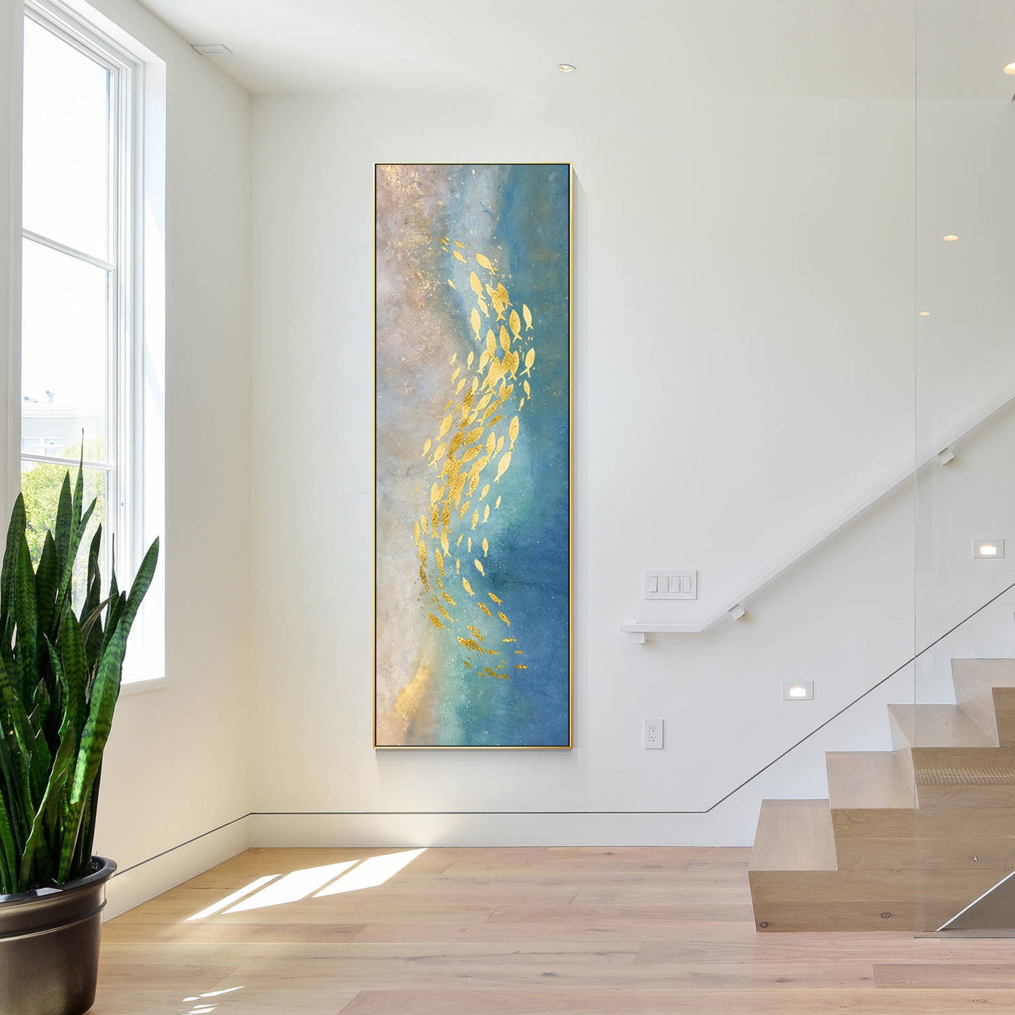 Abstract golden fish painting in tall format with champagne and blue shimmering tones.