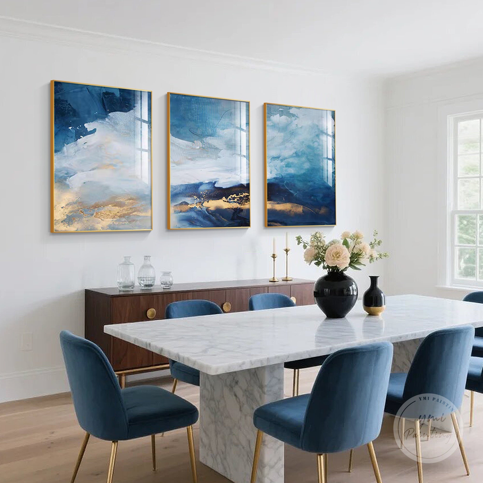 Large abstract wall art set with textured layers of teal blue and soft accents.