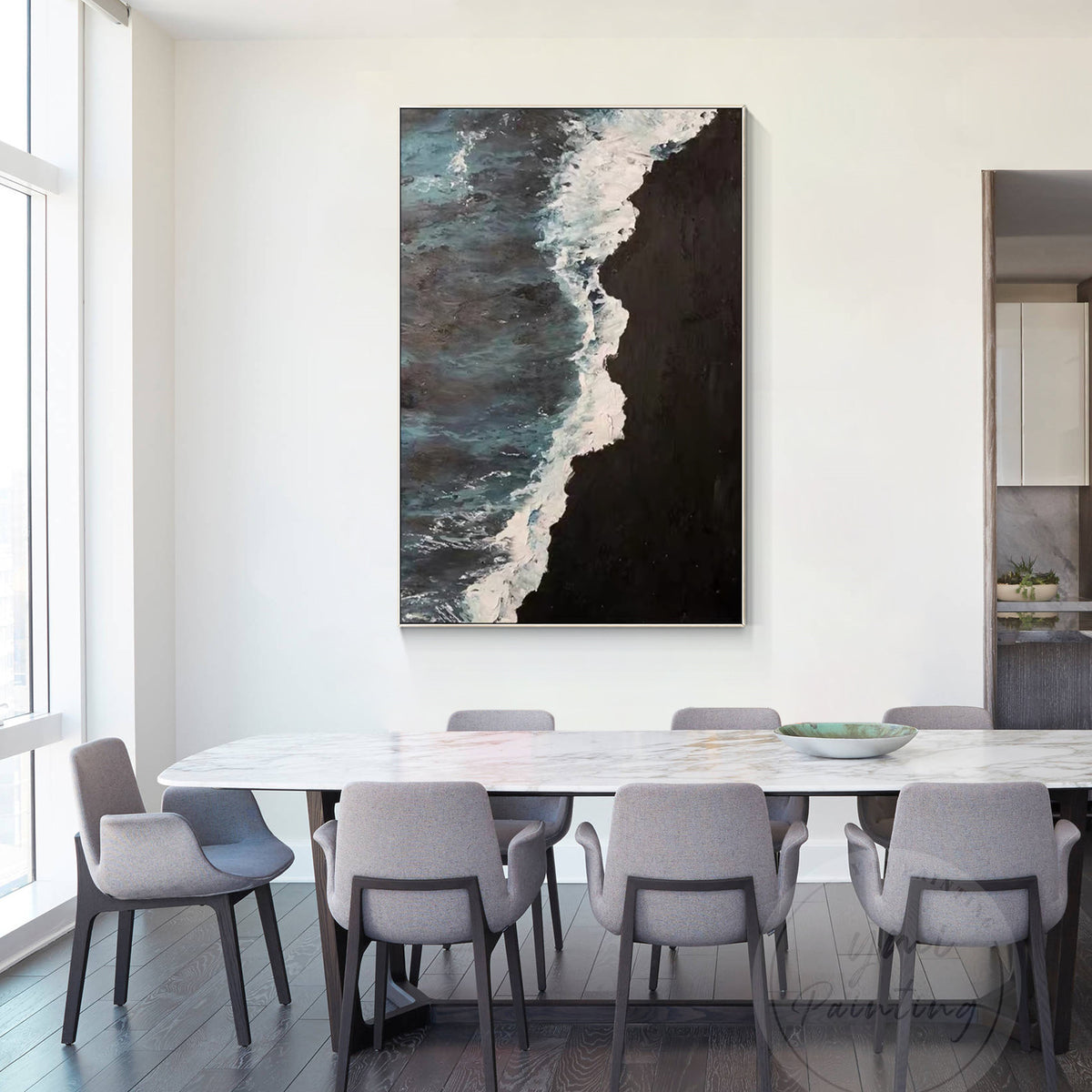 Large framed seascape wall art showcasing moody coastal tones and dramatic waves.