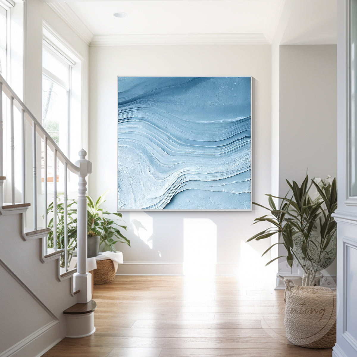 Blue ocean abstract canvas art in a contemporary living room