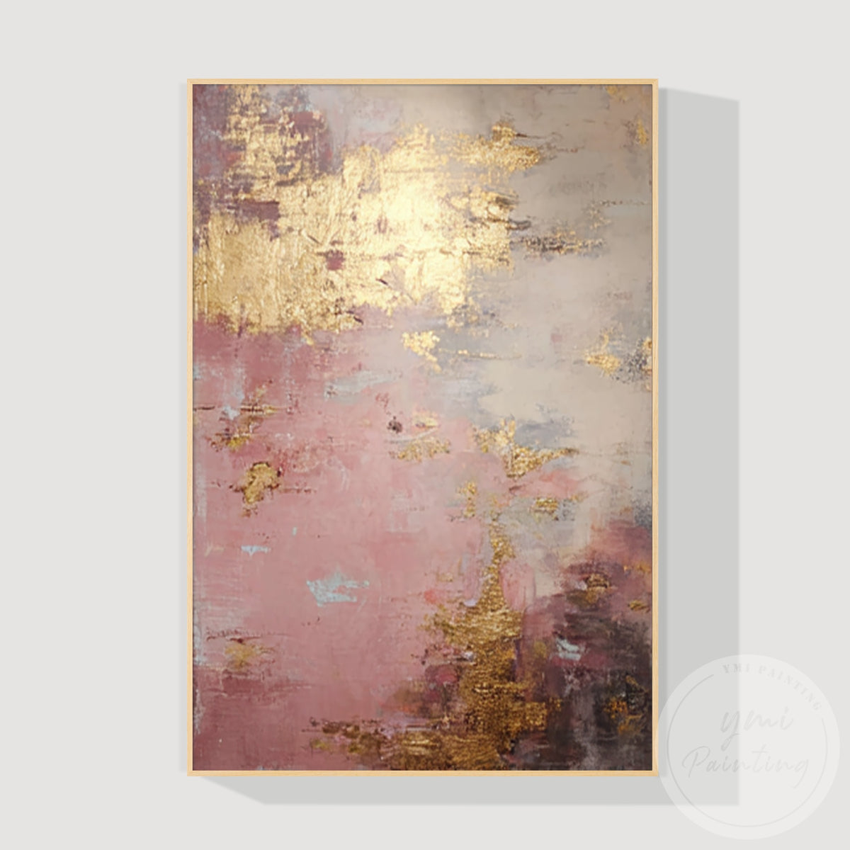 Close-up of raised champagne gold texture on blush pink abstract wall art