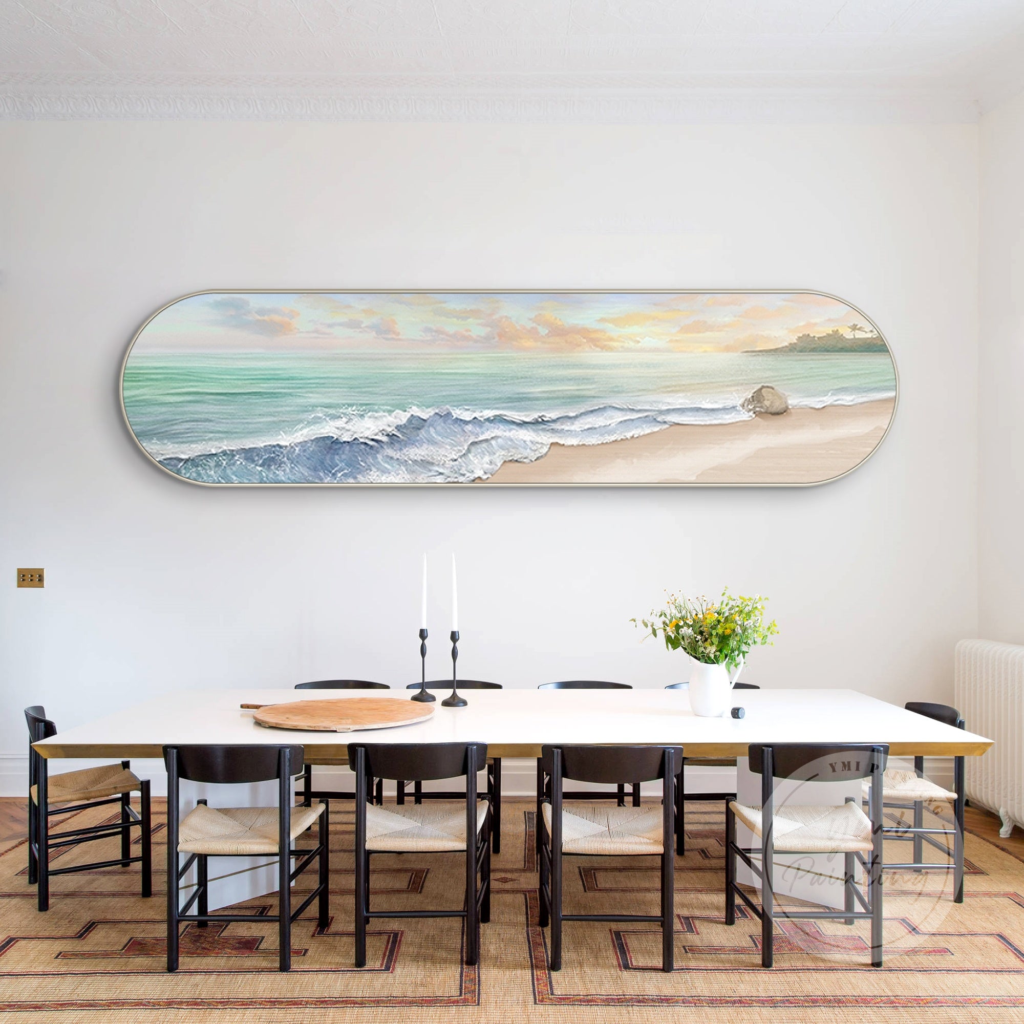 Tranquil seascape wall art with a sandy shore and blue water decor a minimalist living room.