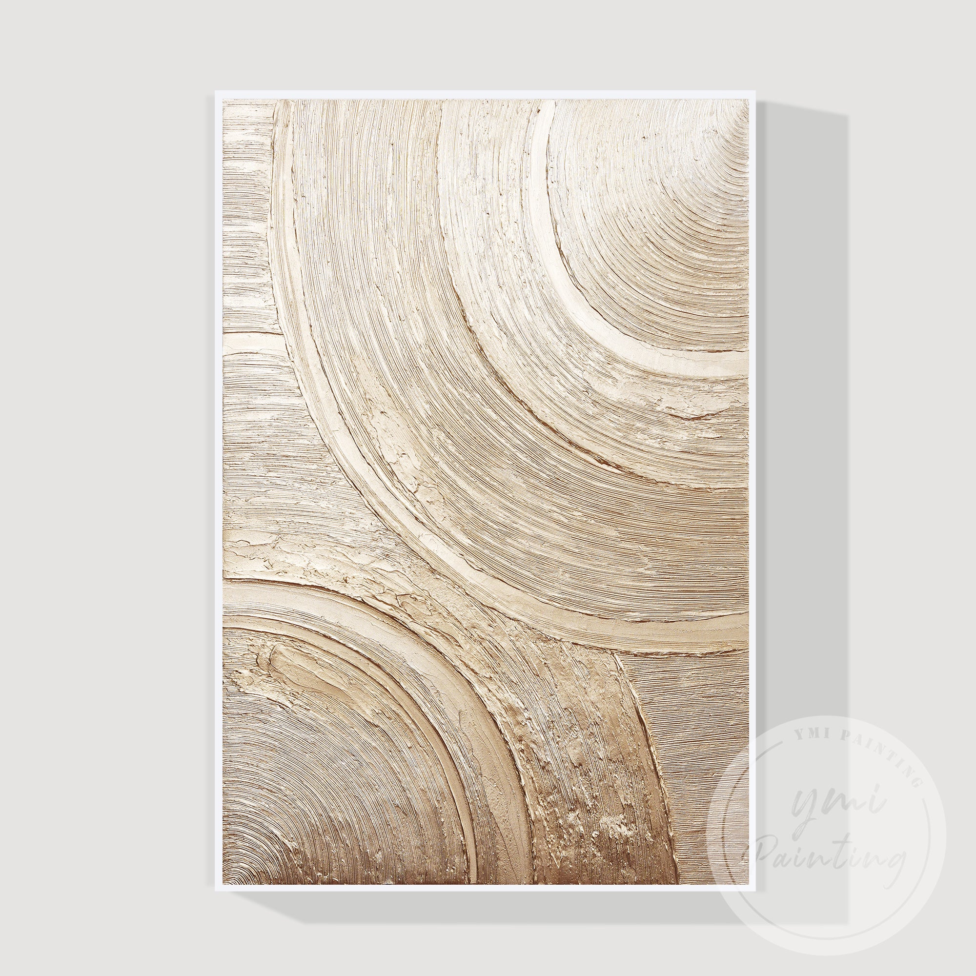 Modern neutral toned plaster wall art with circular motif