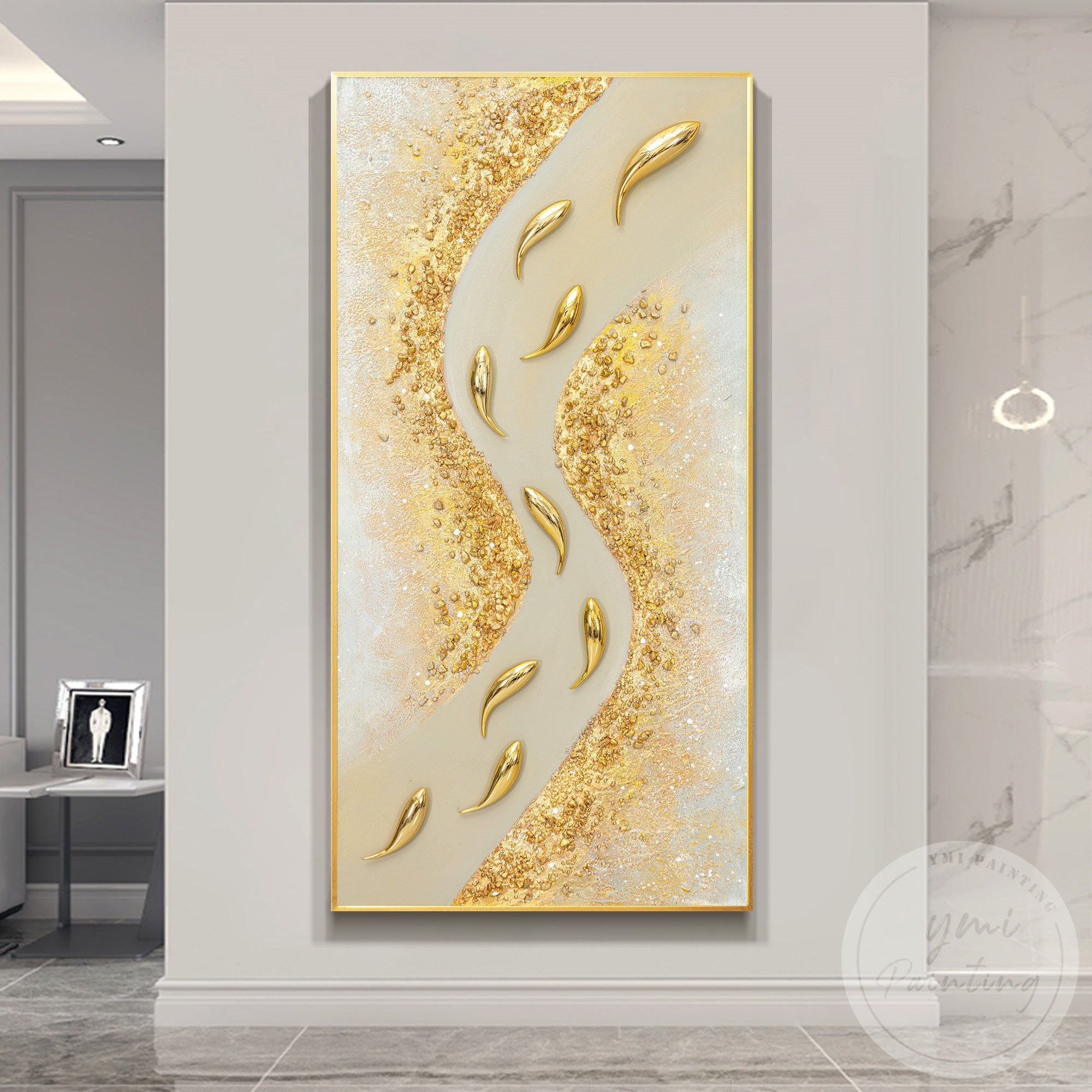 Textured gold sand wall art with abstract fish design